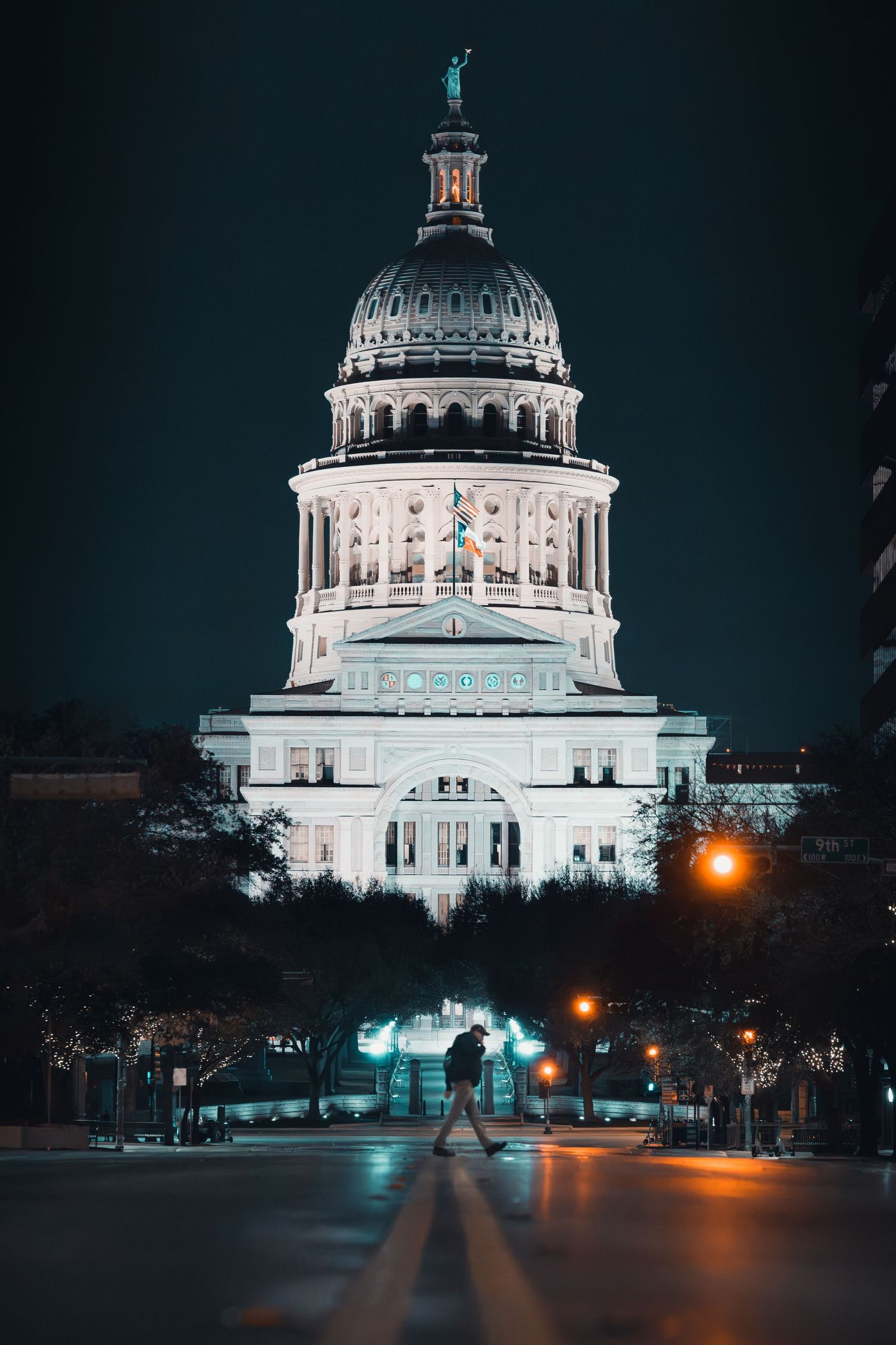 Texas State Capitol illuminated at night in downtown Austin, Texas
