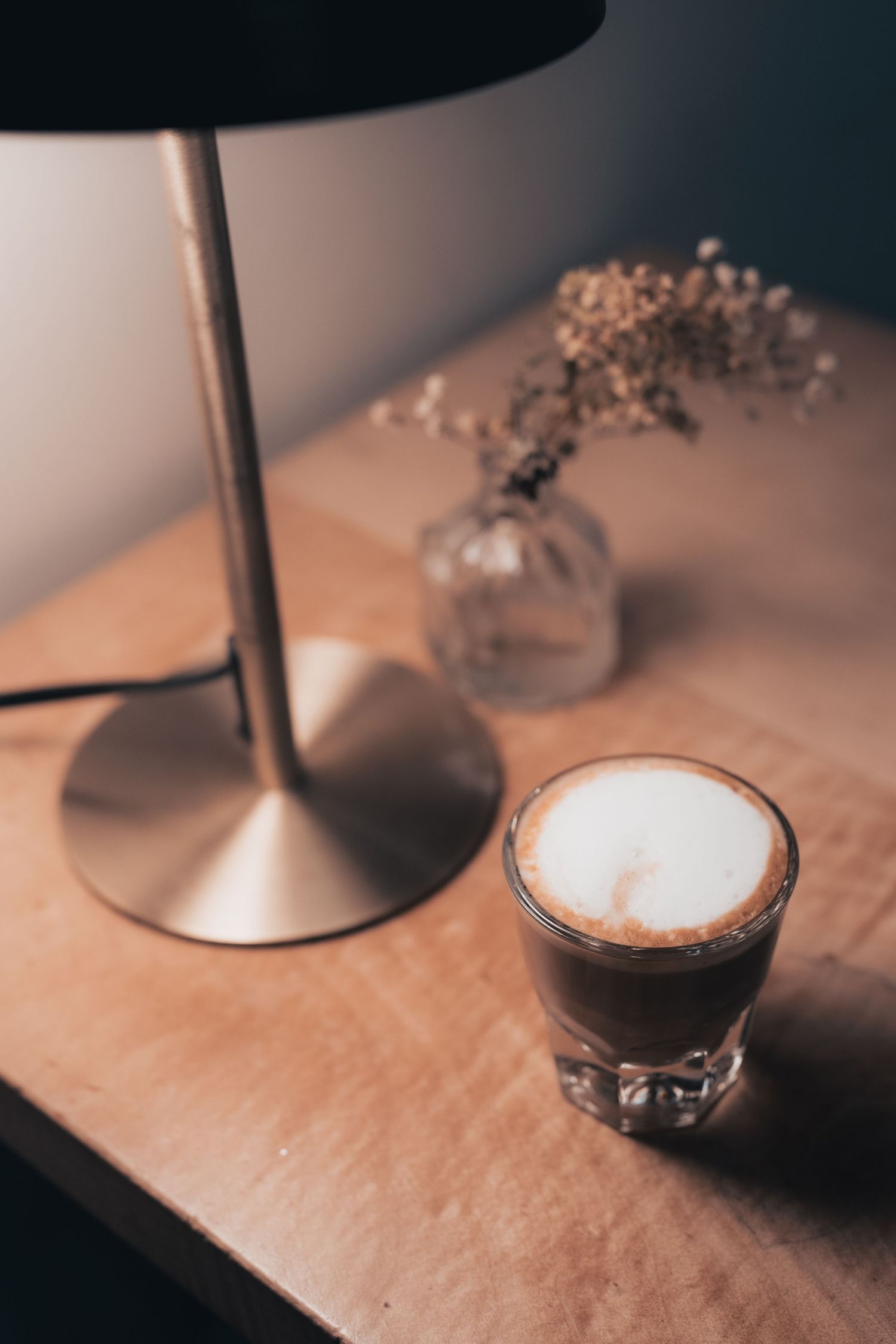 Coffee and tabletop details inside Halcyon Coffee, Bar & Lounge in downtown Austin
