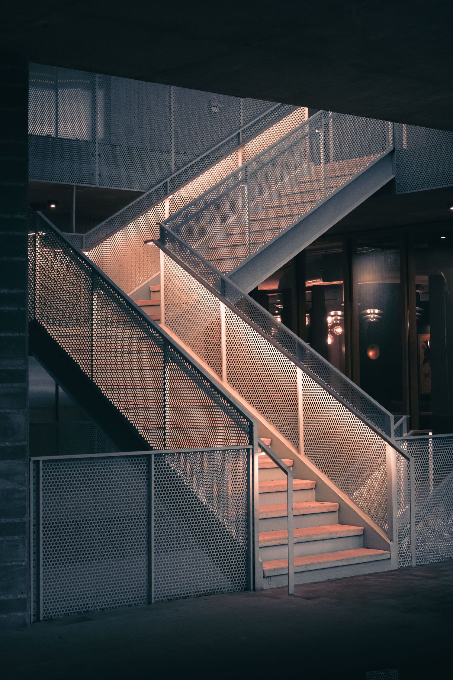 Illuminated exterior staircase at the Chioco Design building in East Austin, Texas