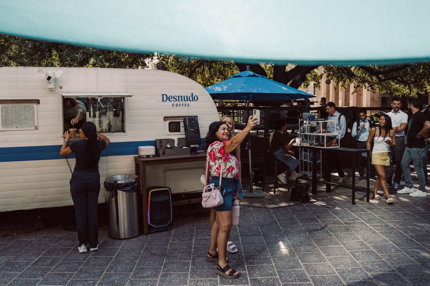 Customers gathered around the Desnudo Coffee trailer in downtown Austin, Texas