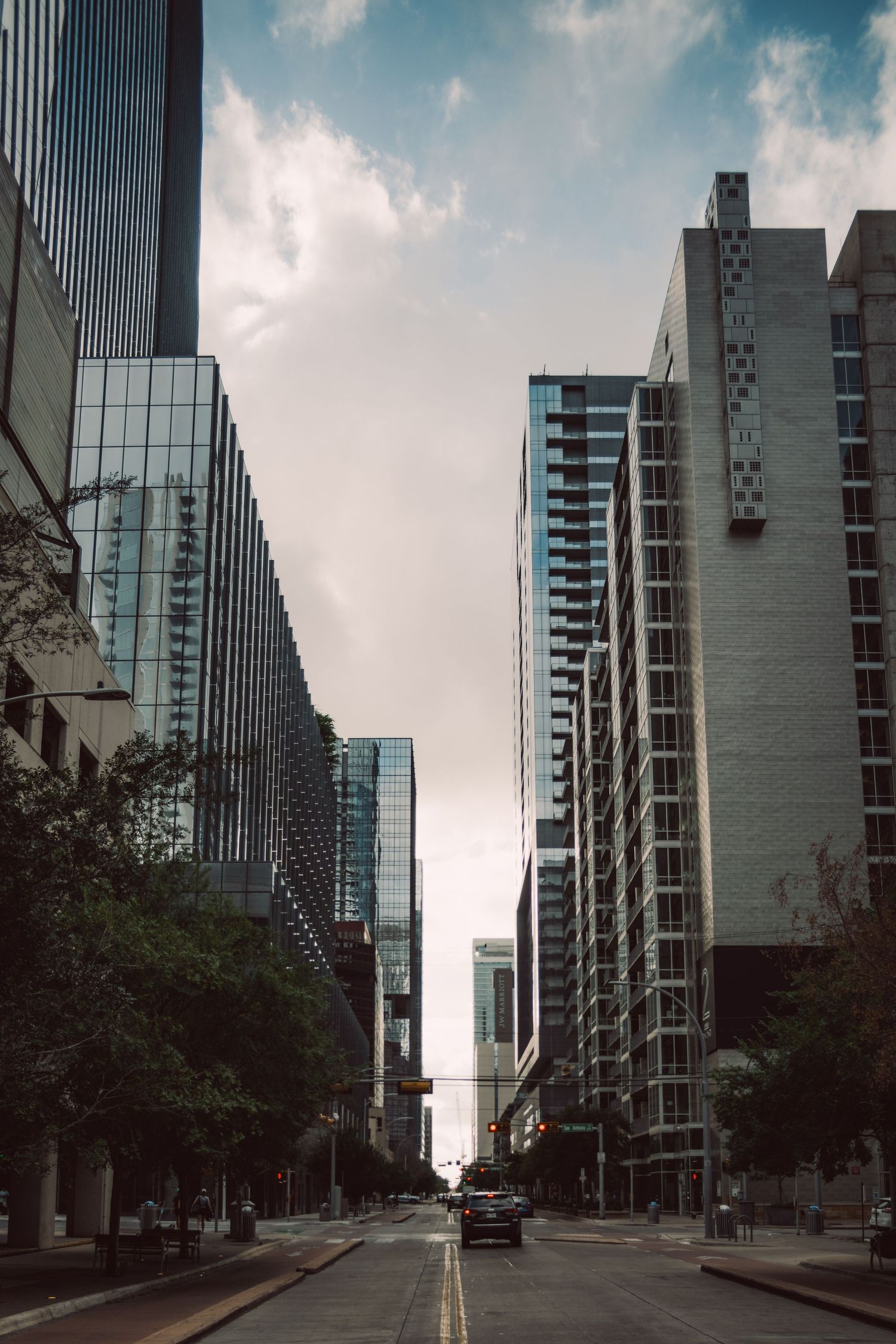 Urban street framed by high-rise architecture in downtown Austin