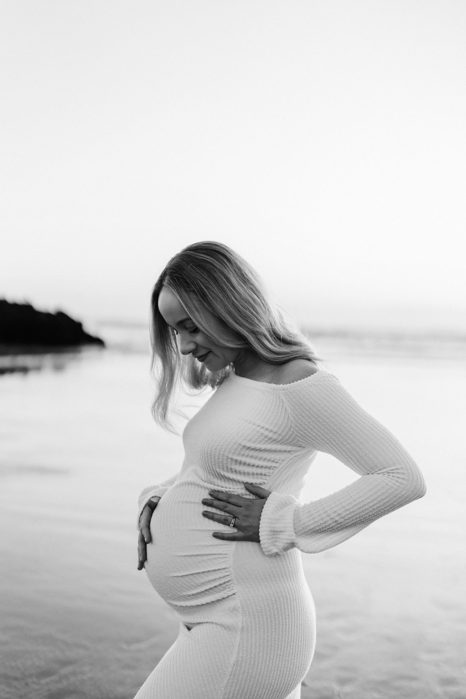 A black and white of an expecting mother on a Christchurch Bean