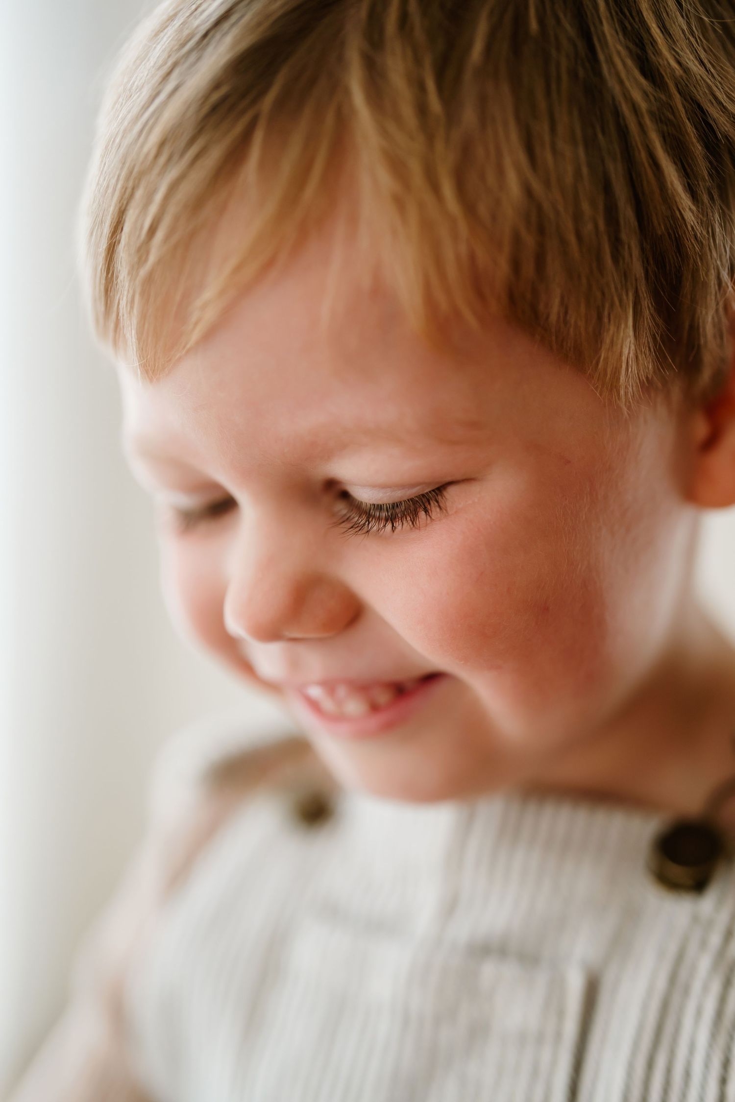 Natural close-up portrait of a young boy during a Christchurch family photo session