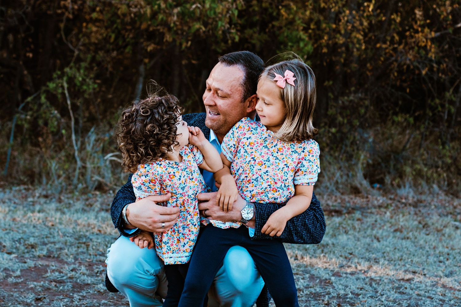 A series of outdoor family portrait photographs showing tender moments between parent and children on a natural backdrop.