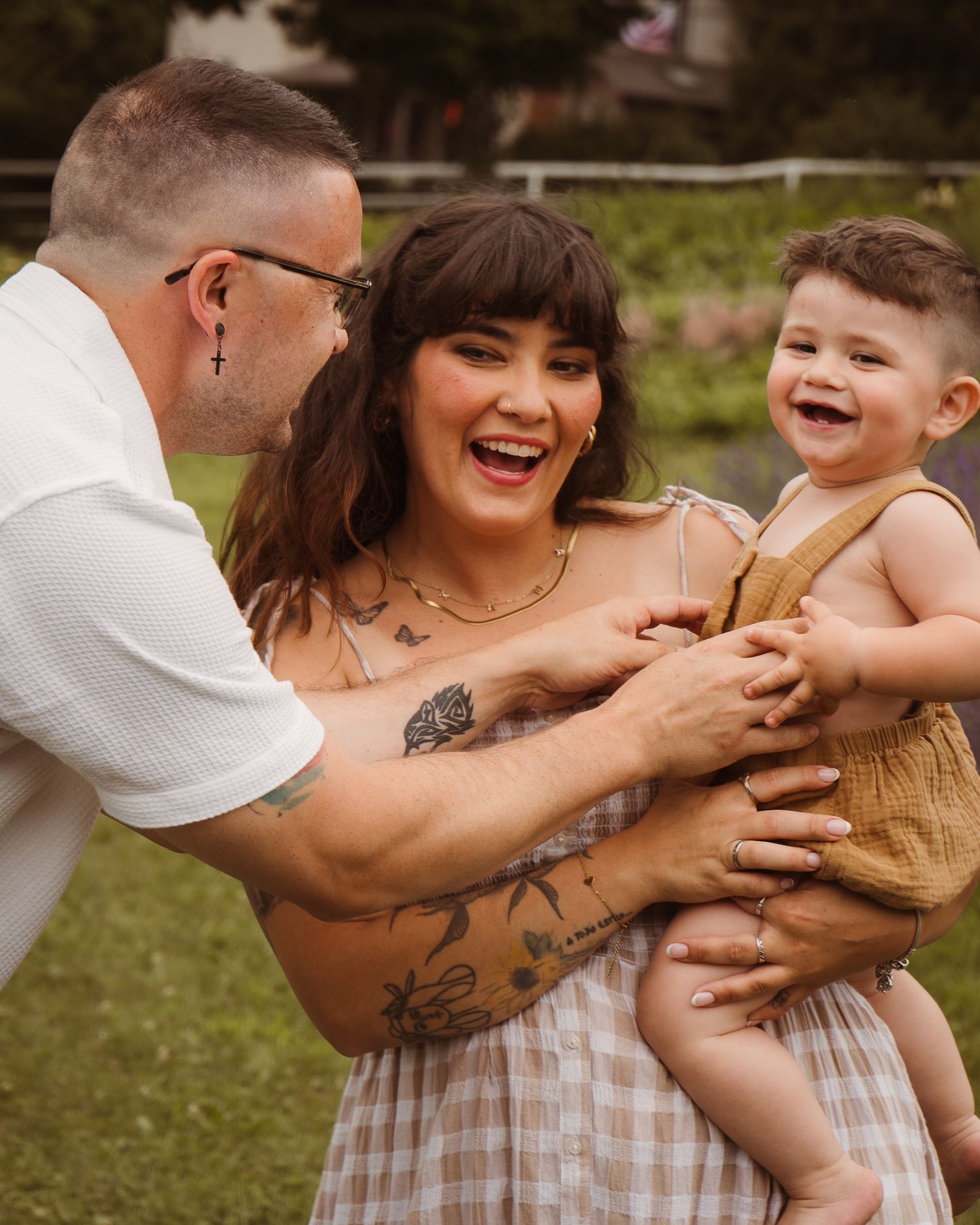 Candid family photography session with children playing outdoors