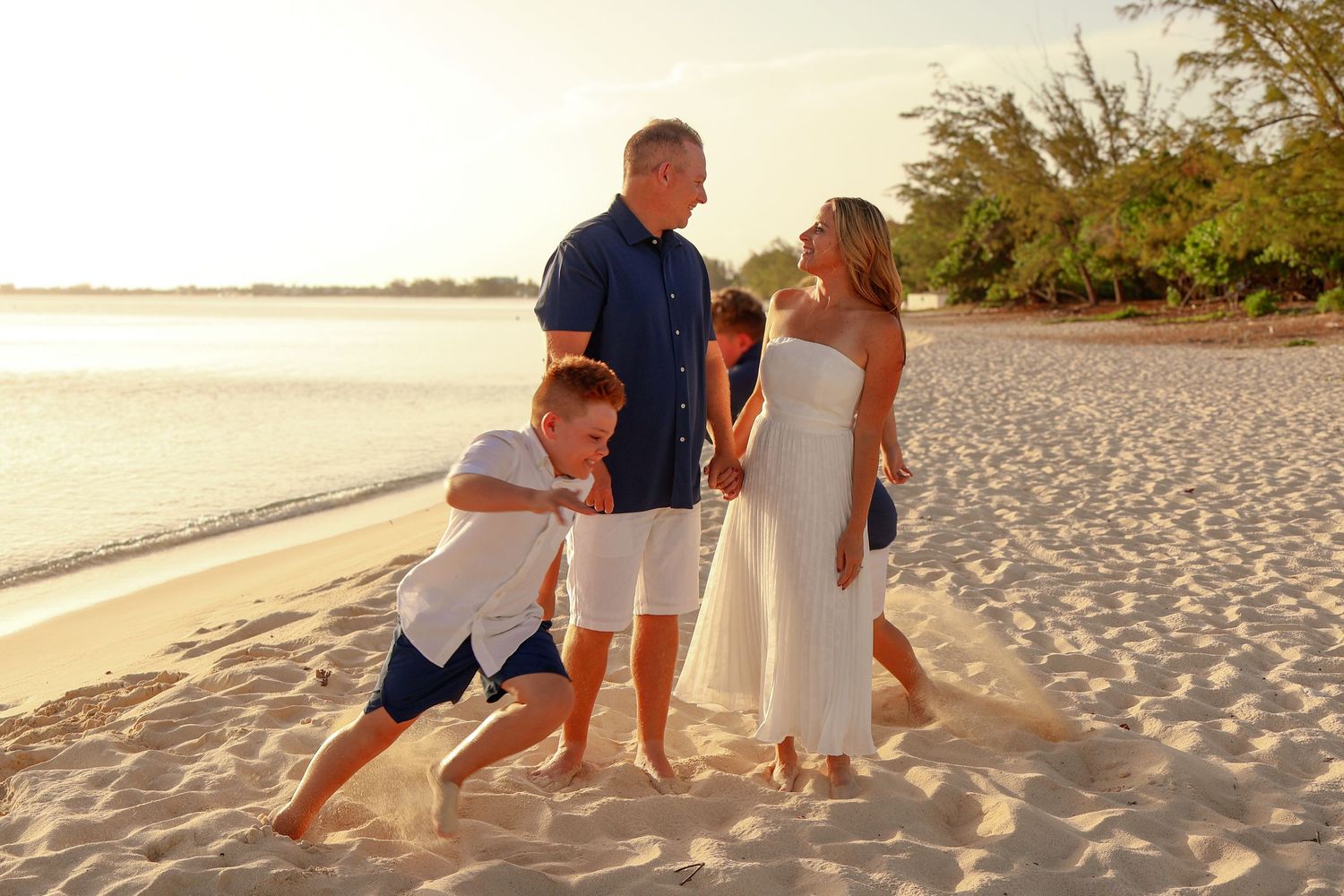 Family Beach Photography in Grand Cayman
Relaxed sunset family sessions on Seven Mile Beach, capturing genuine smiles, playful moments, and