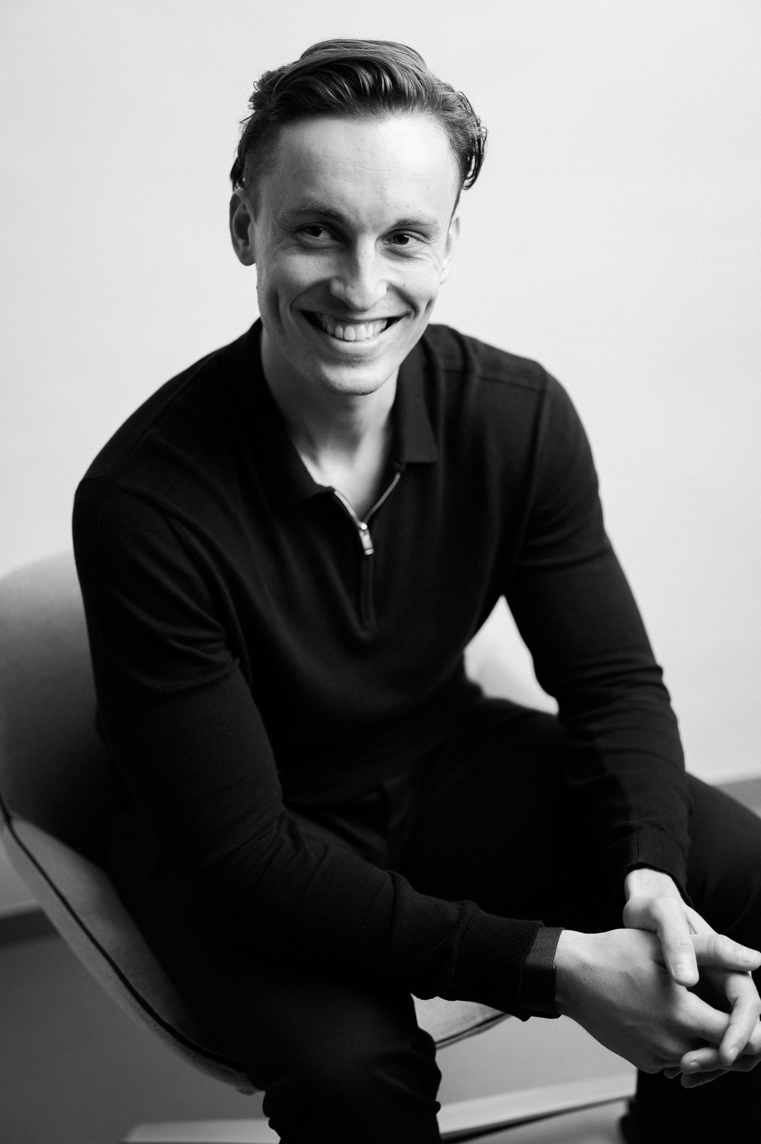 Black and white portrait series showing natural expressions and movement.