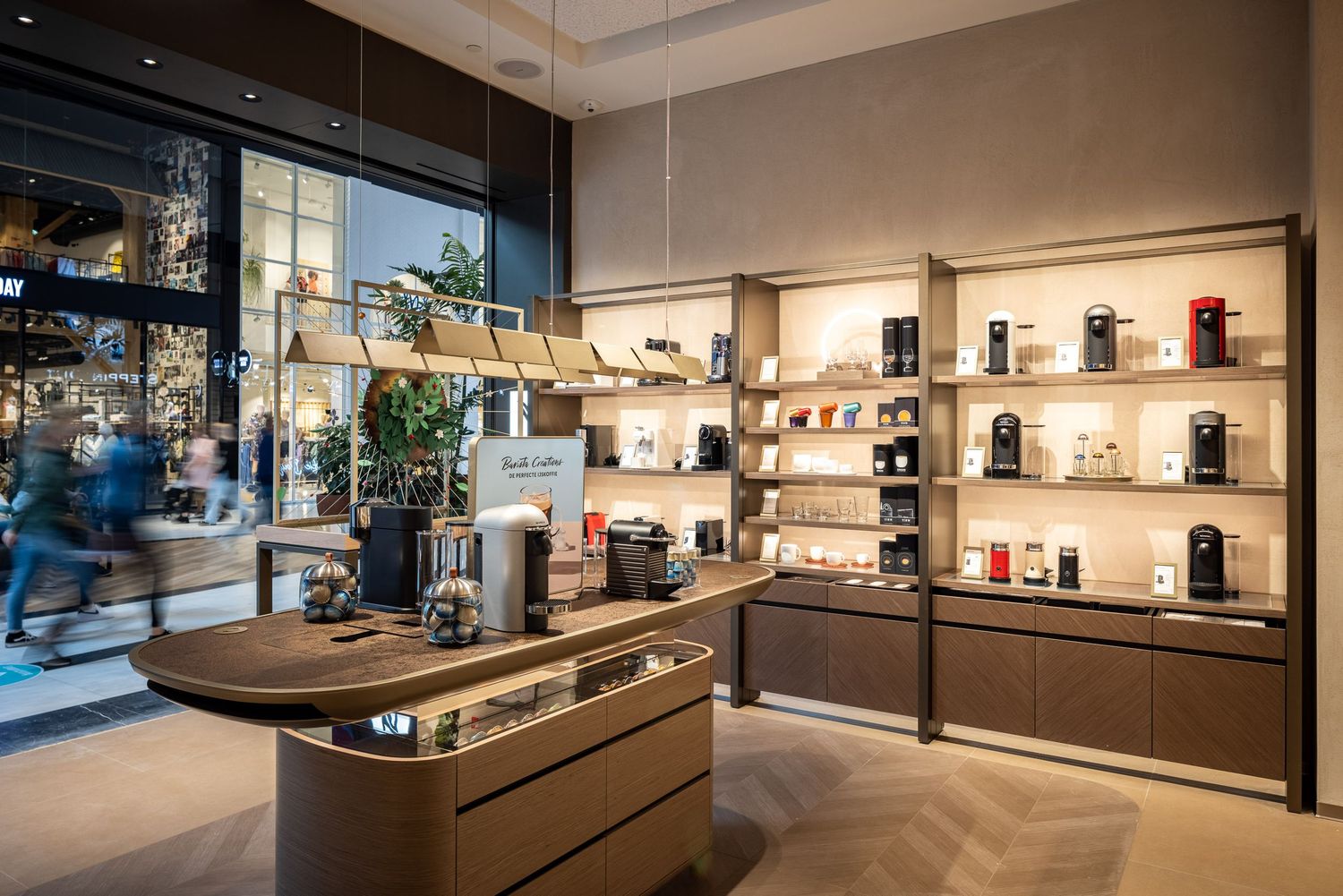 Upscale retail showroom featuring elegant product displays and warm lighting.