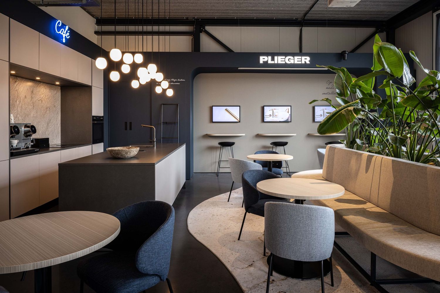 Modern office interior with sleek furniture, round pendant lights, and dark walls showcasing contemporary workspace design.
