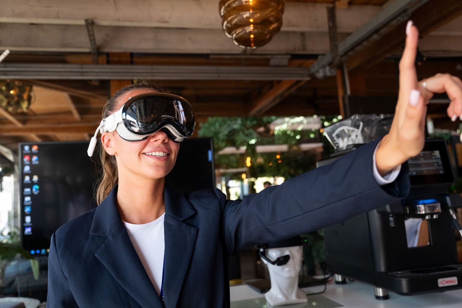 People experiencing virtual reality technology in a modern office environment.