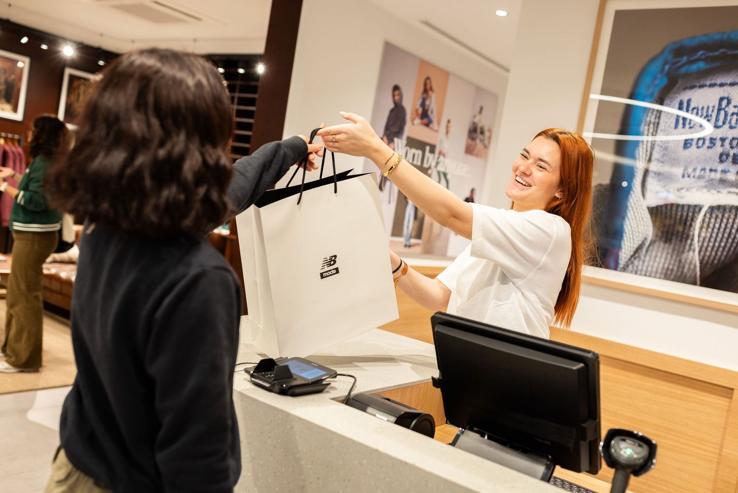 Retail store interior showing product displays and customer interaction areas.