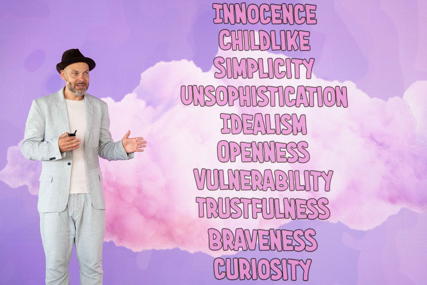 Pink and white themed presentation slide showing business values and concepts.