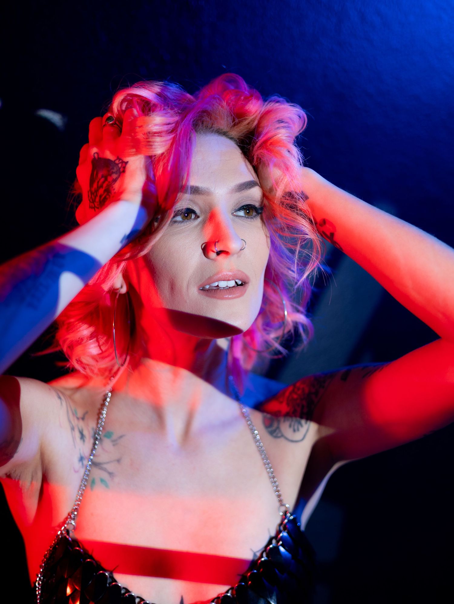 lady with red hair in lights