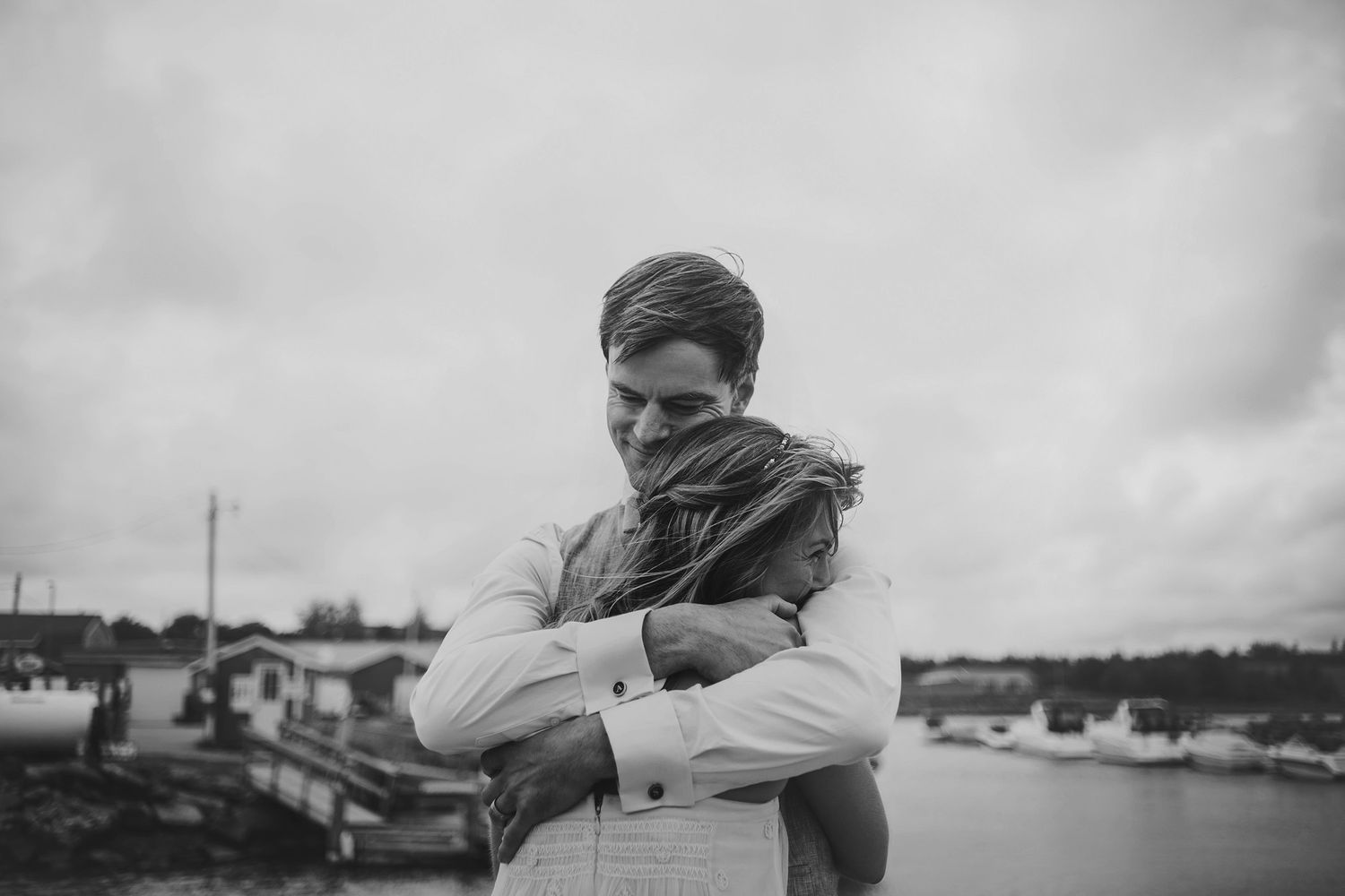 Bride & Groom hugging at their wedding in Stanley Bridge, PEI
