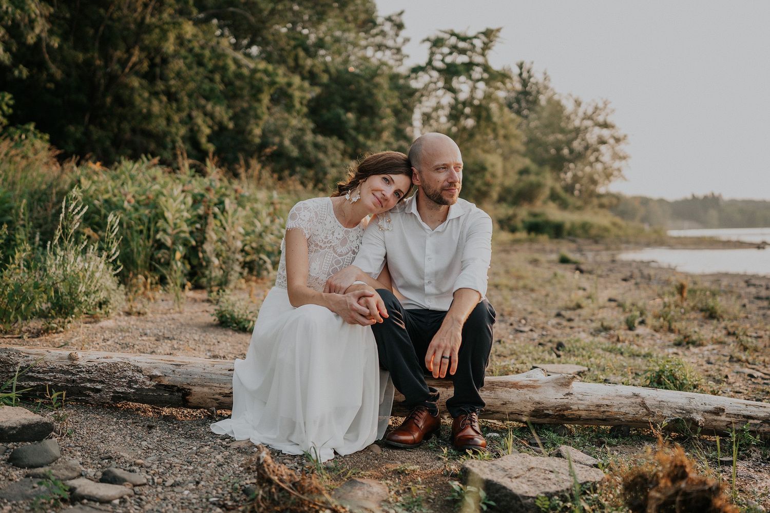 Bride & groom enjoy a sunset by the St. John River on their wedding day in Fredericton, New Brunswick.