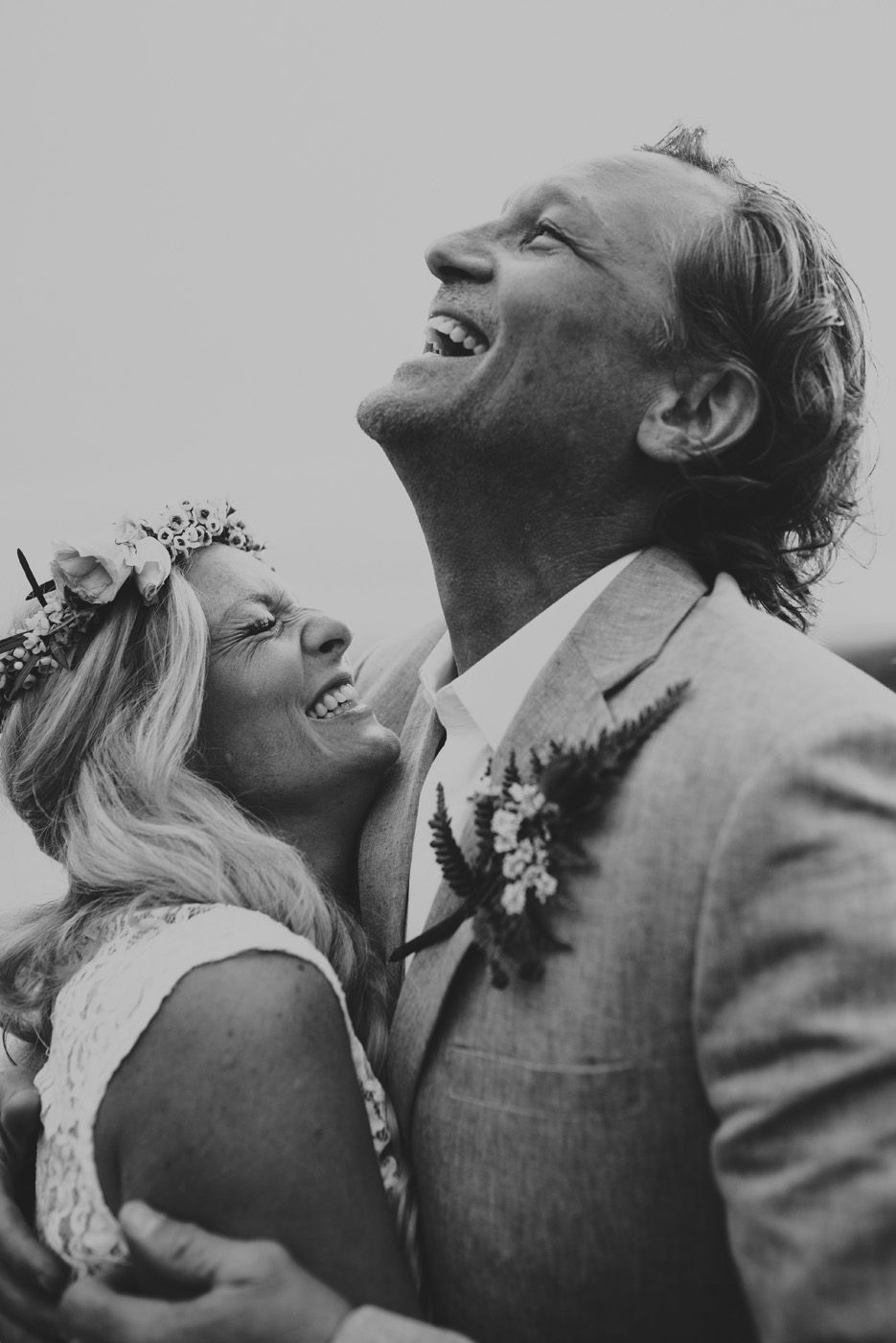 Bride & groom laughing on their wedding day in New Brunswick