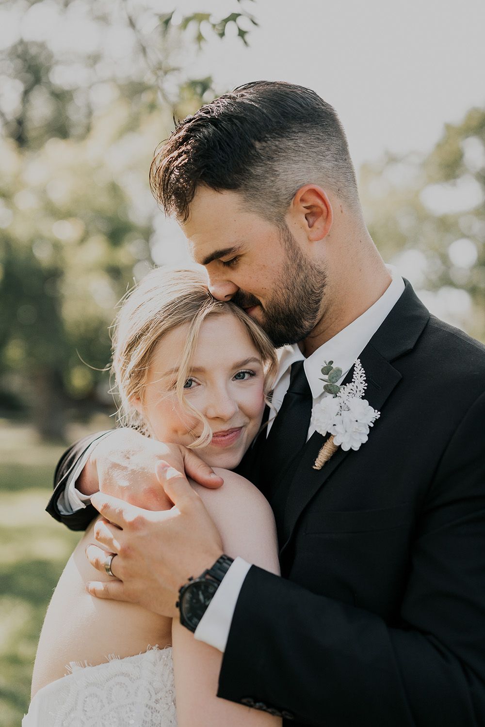 A couple hugs at their Moncton, New Brunswick Wedding