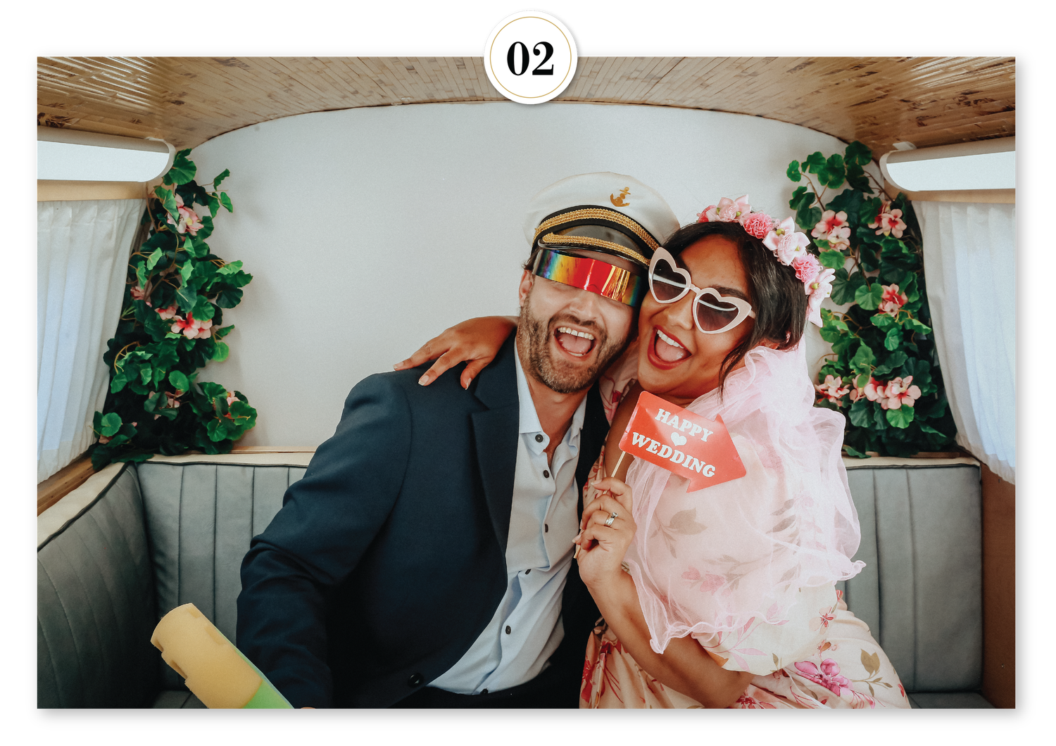 Romantic garden photo booth backdrop featuring lush florals and greenery, perfect for weddings and elegant celebrations.