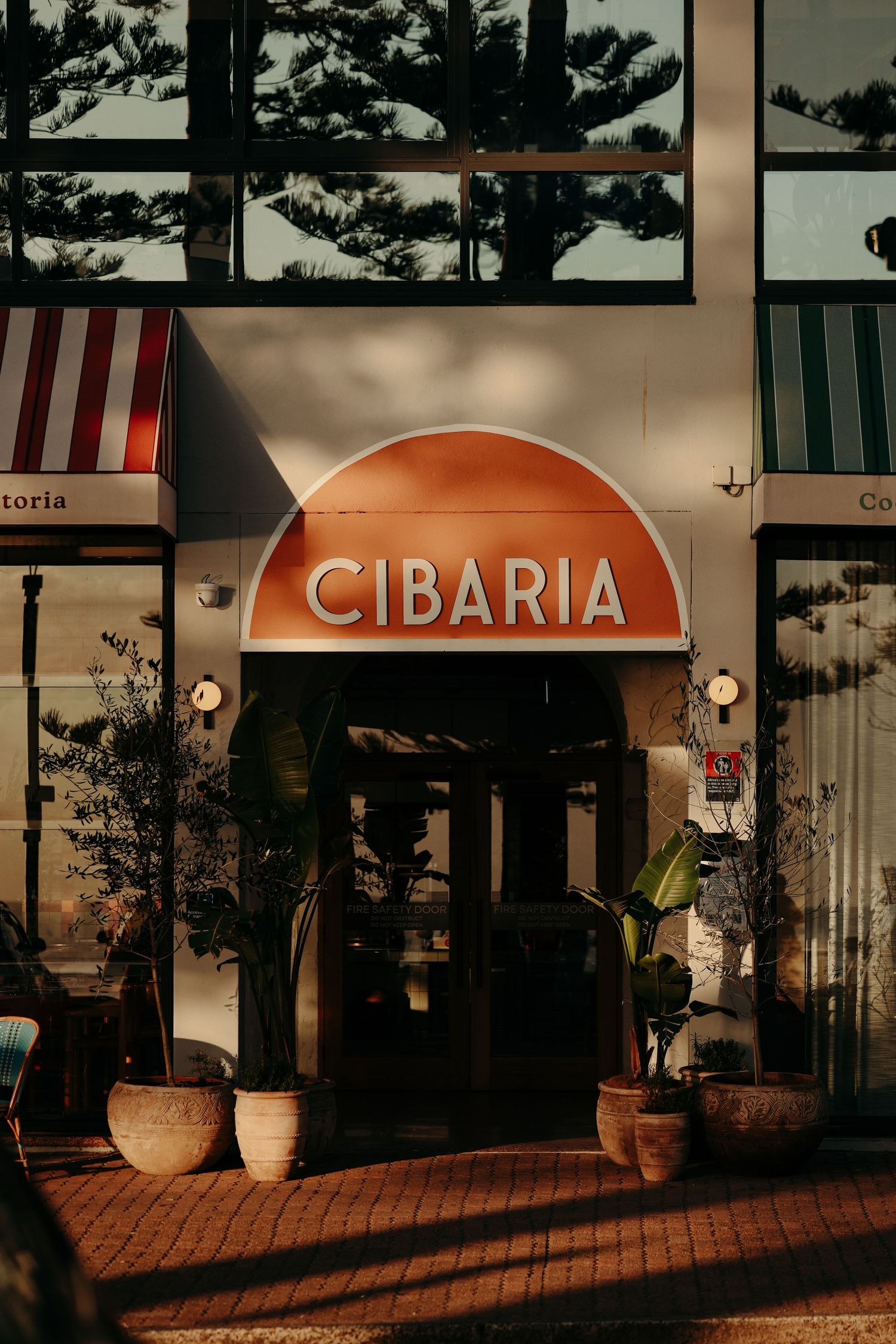 Restaurant storefront in the morning light.