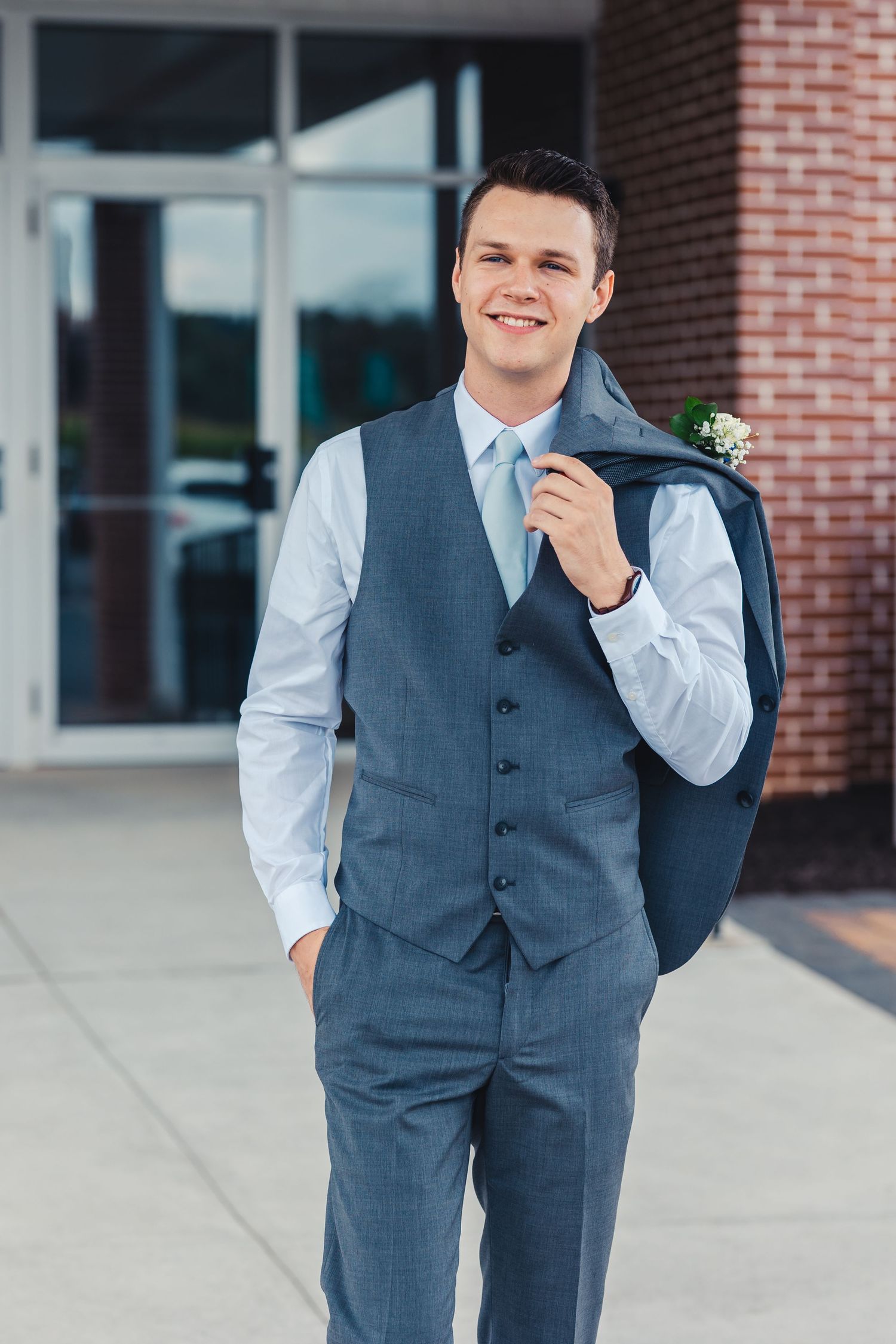 Groom posing for classic wedding portrait in Palm Beach Gardens