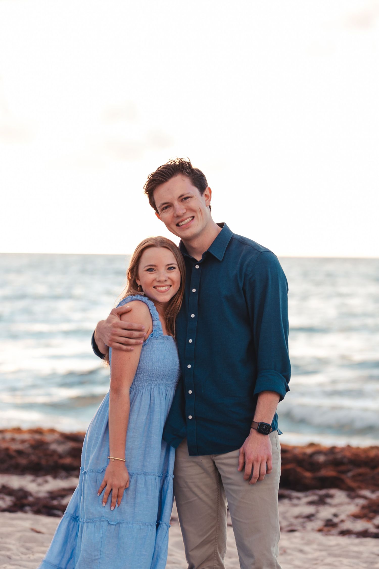 Couple smiling together on the beach during West Palm Beach engagement session