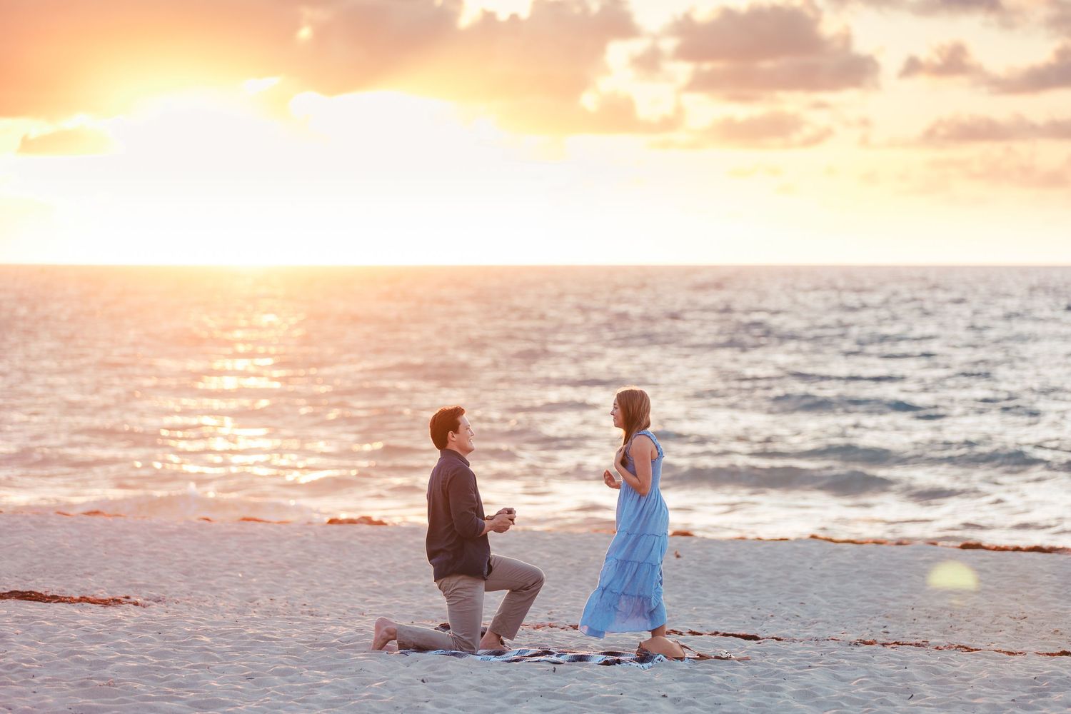 Beach proposal at sunset in West Palm Beach Florida engagement session