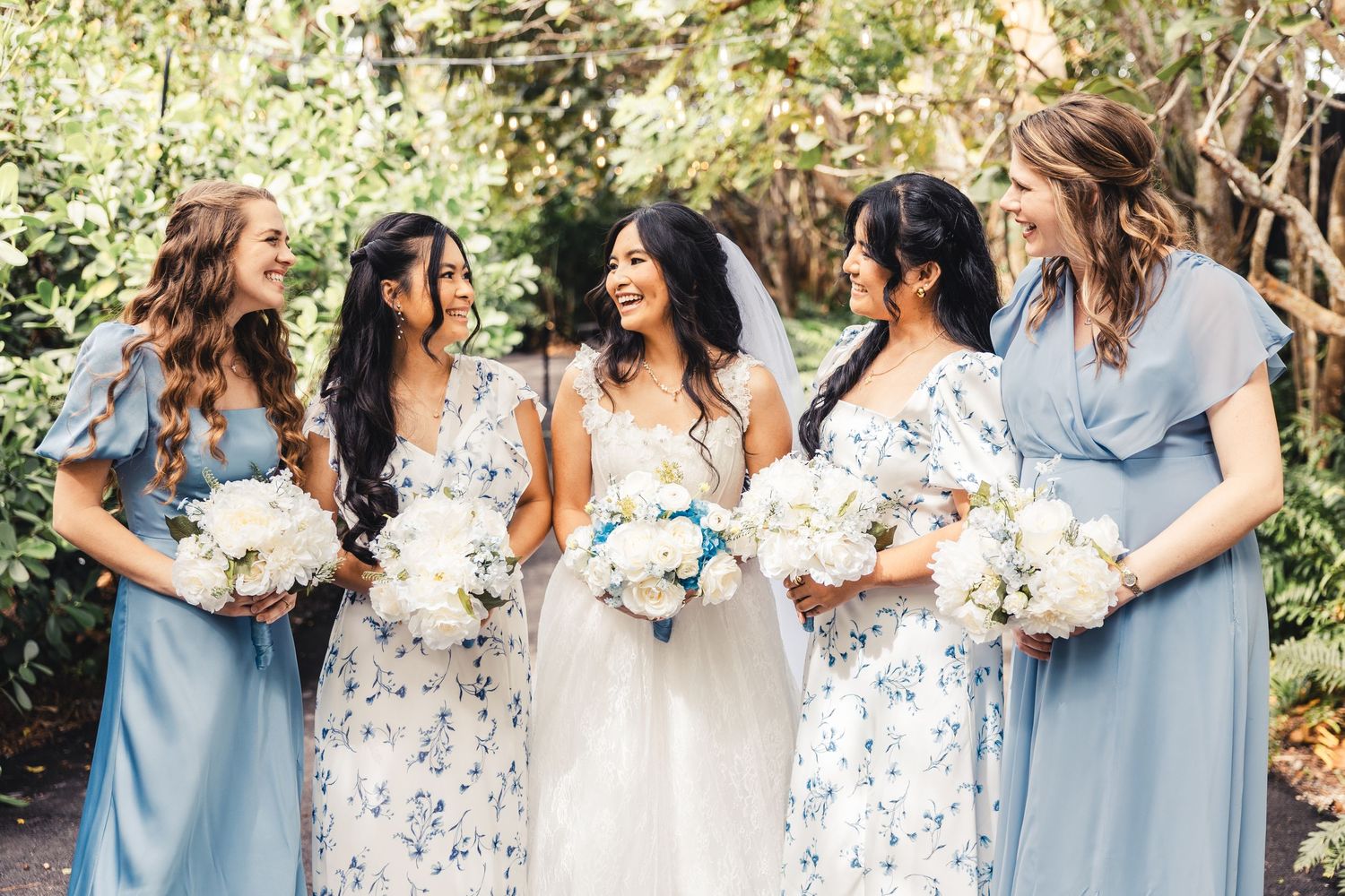 Bride and bridesmaids group portrait at Palm Beach Gardens wedding