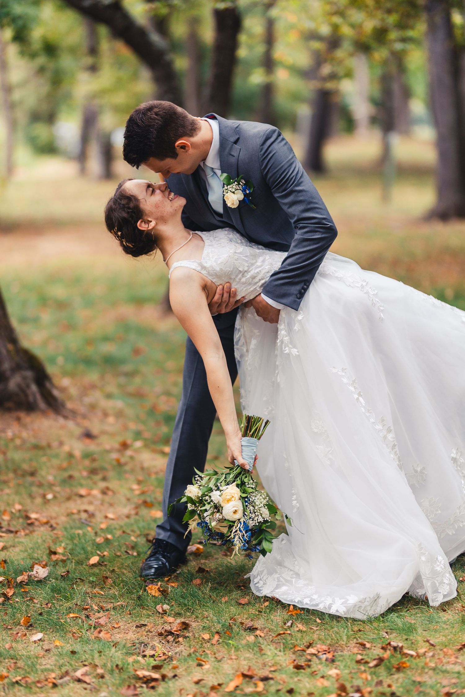Bride and groom kissing during romantic wedding portrait in Palm Beach Gardens