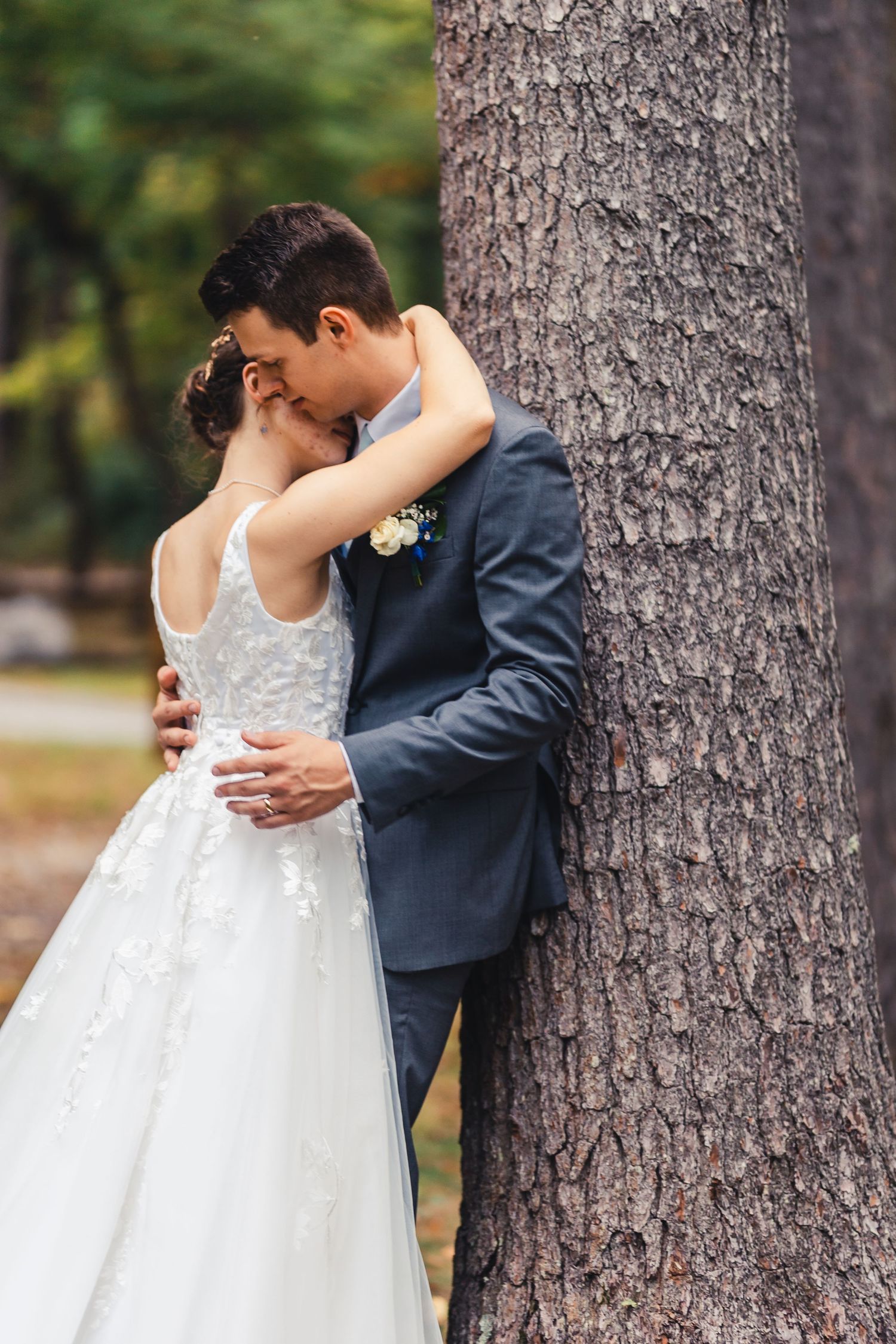 Bride and groom kissing during romantic outdoor wedding portrait in Palm Beach Gardens