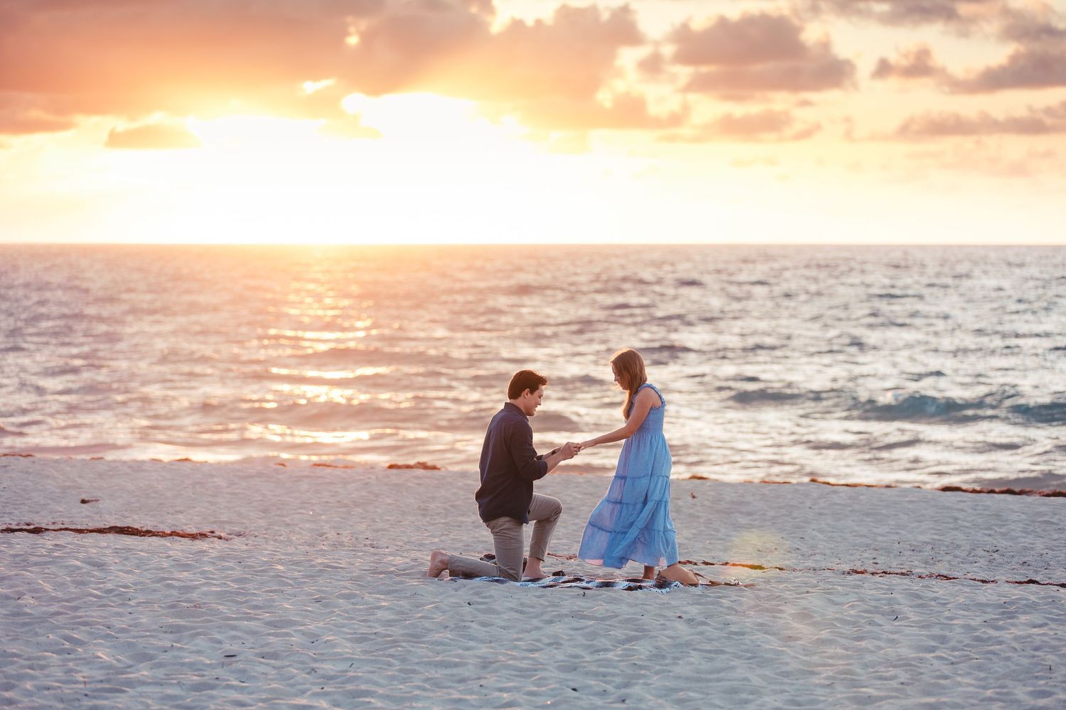Couple proposal on the beach at sunset in Palm Beach Gardens