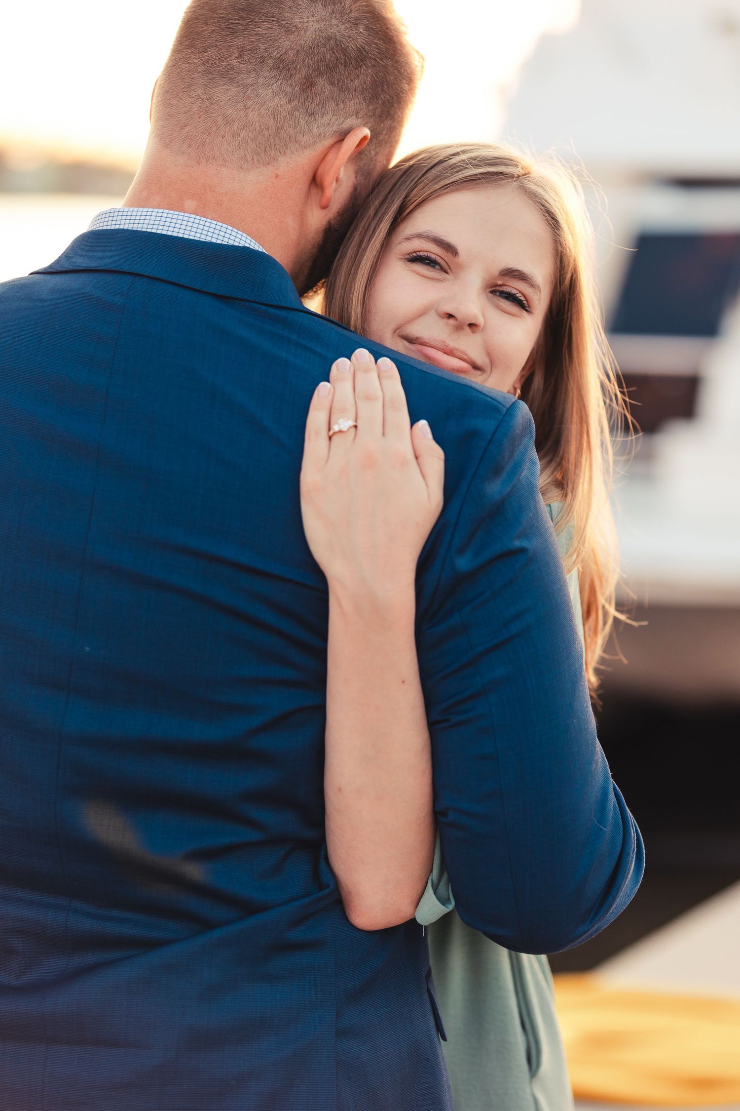 Couple embracing on the beach at sunset during West Palm Beach Florida engagement session