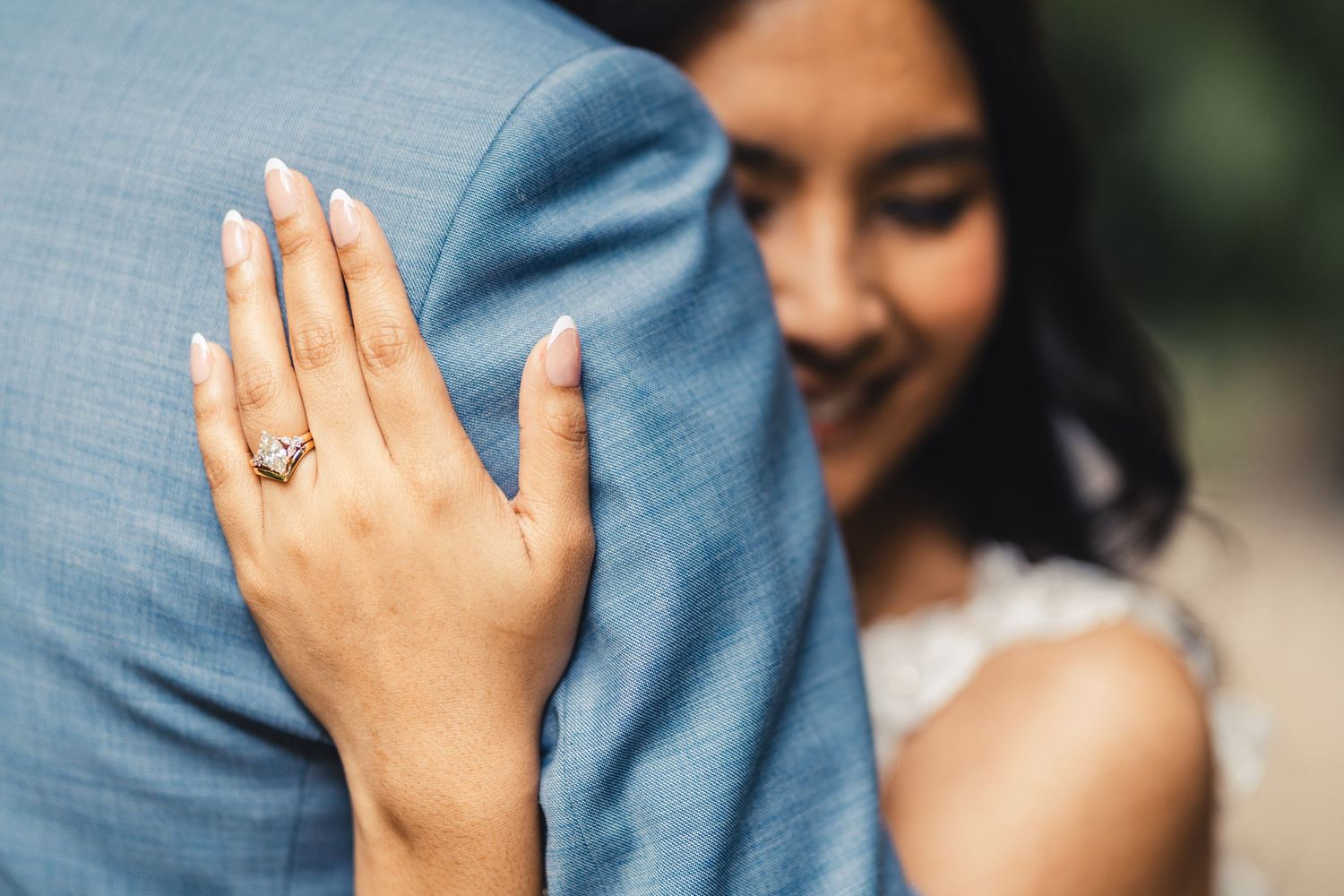 Bride showing engagement ring during wedding portrait in Palm Beach Gardens