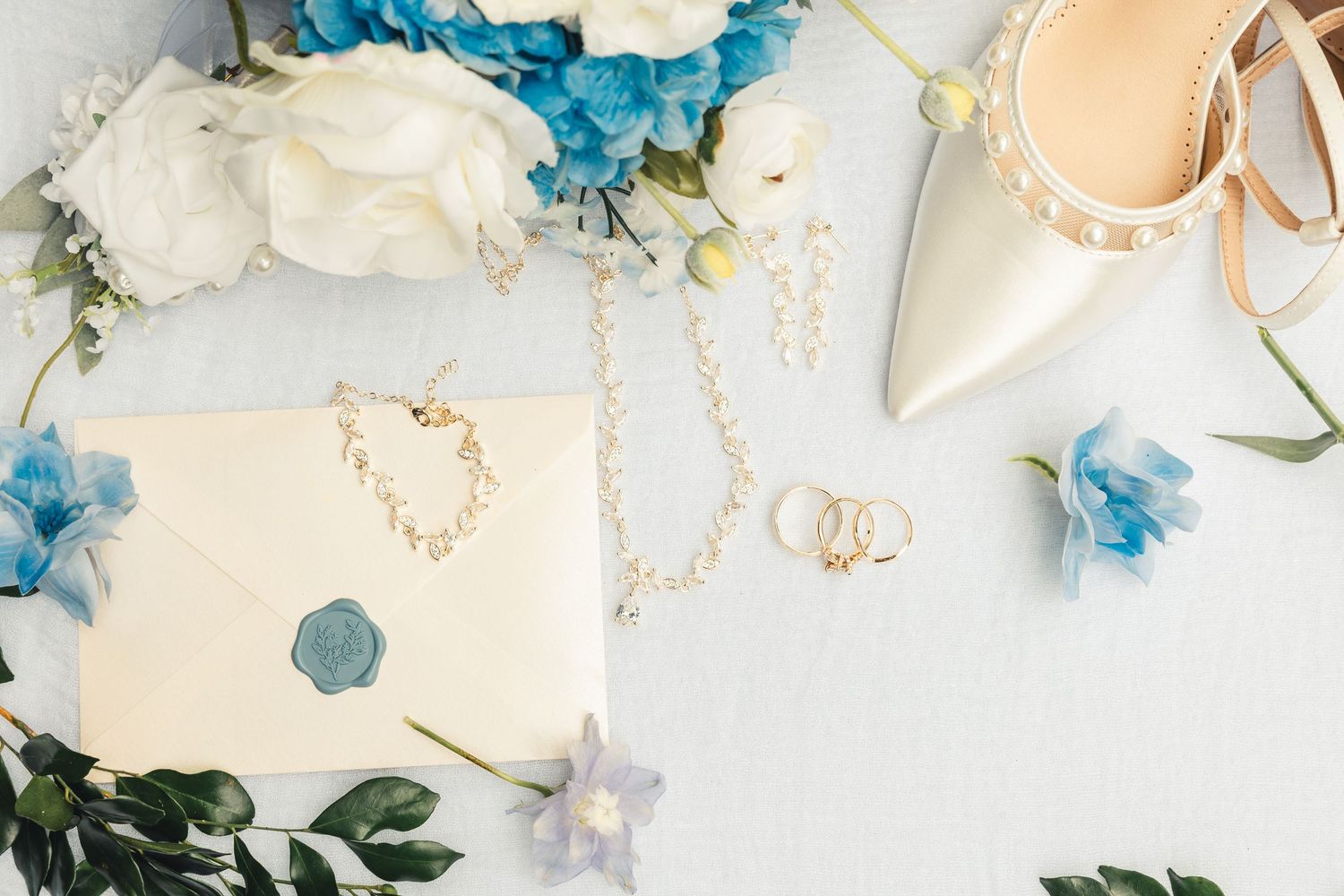Wedding flat lay with rings and details in Palm Beach Gardens