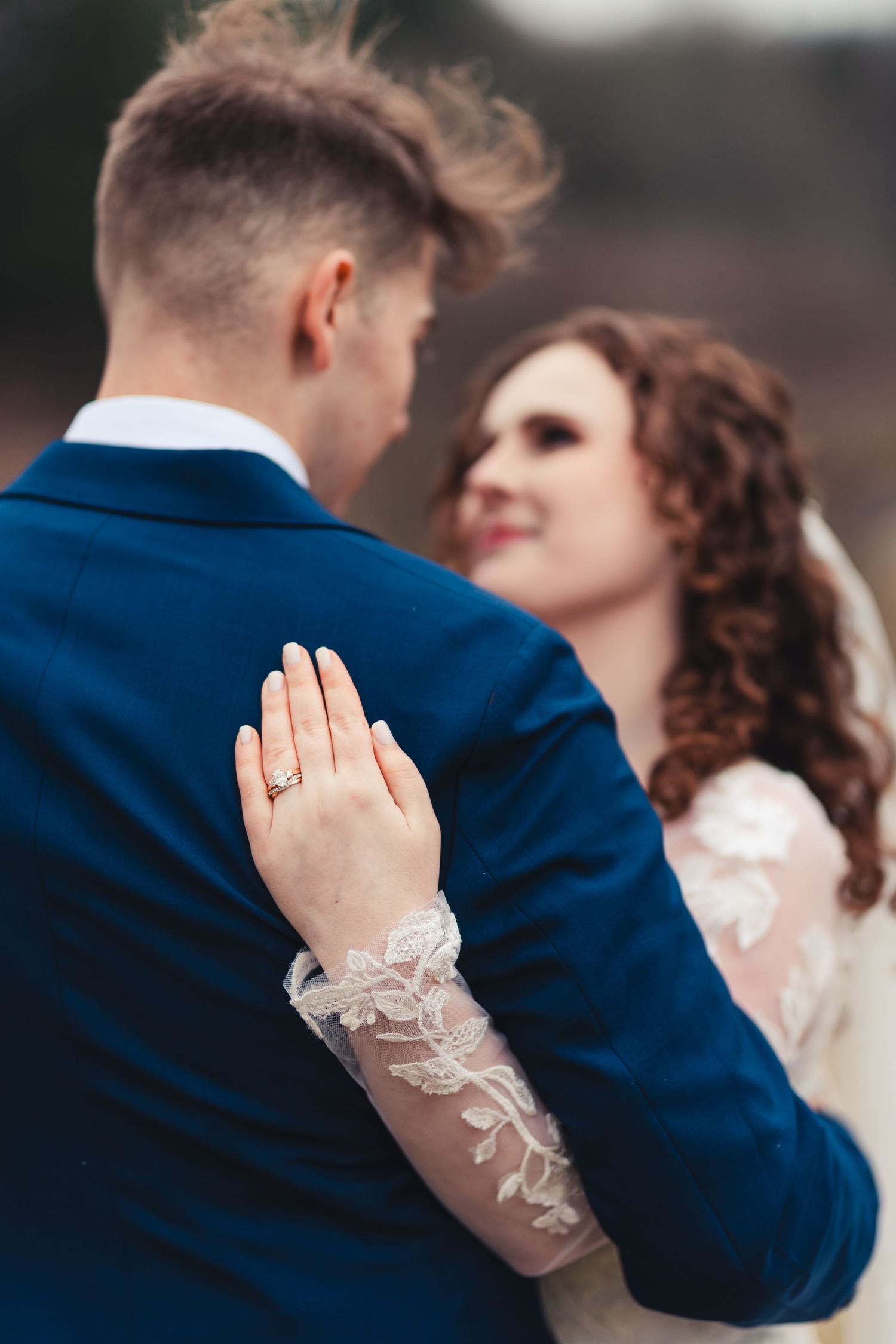 Bride and groom embracing during classic Palm Beach Gardens wedding portrait