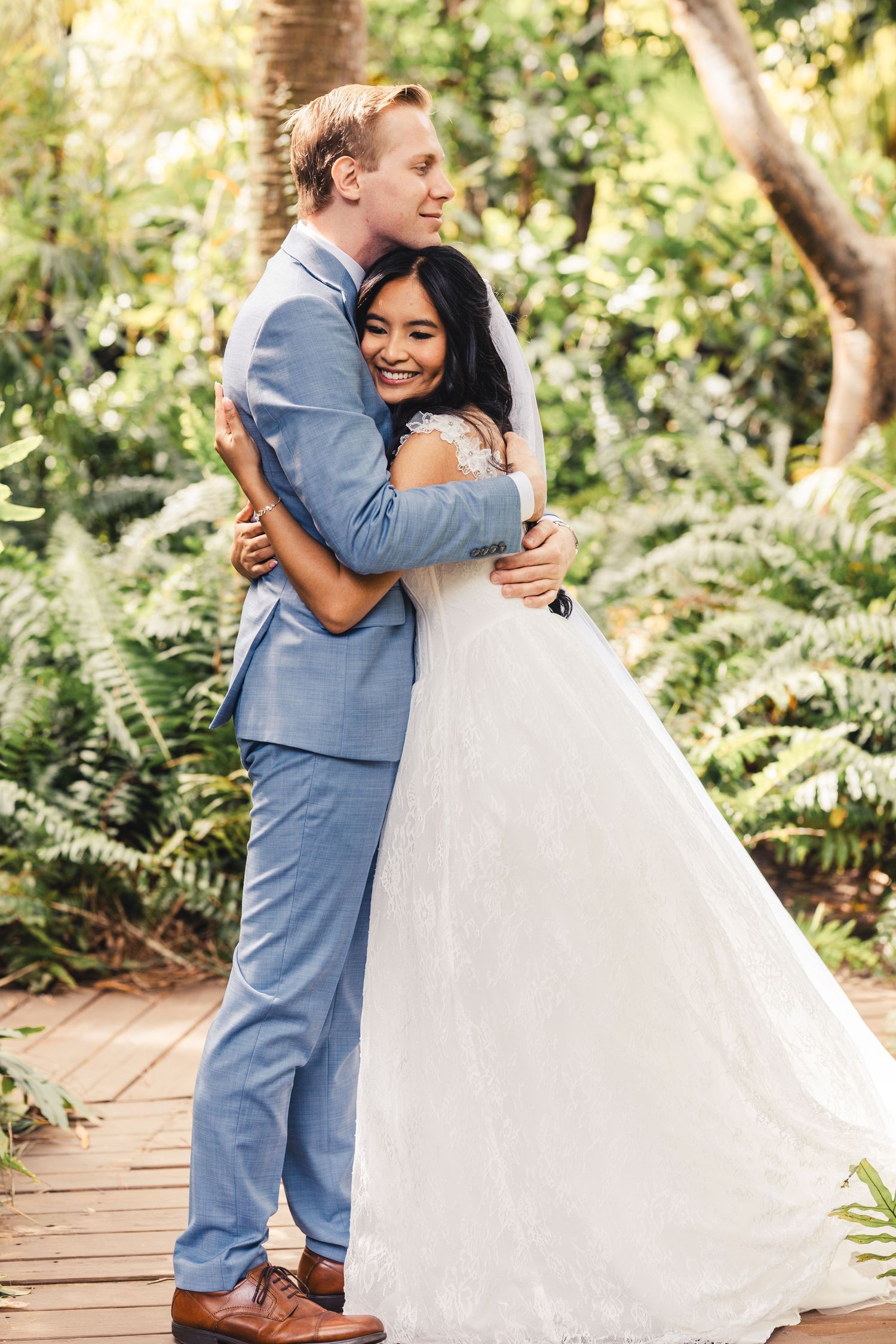 Bride and groom embracing during wedding portrait in Palm Beach Gardens