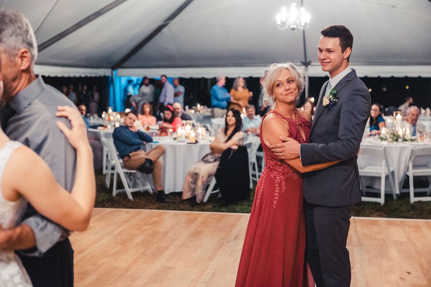 Groom dancing with mother during wedding reception in Palm Beach Gardens