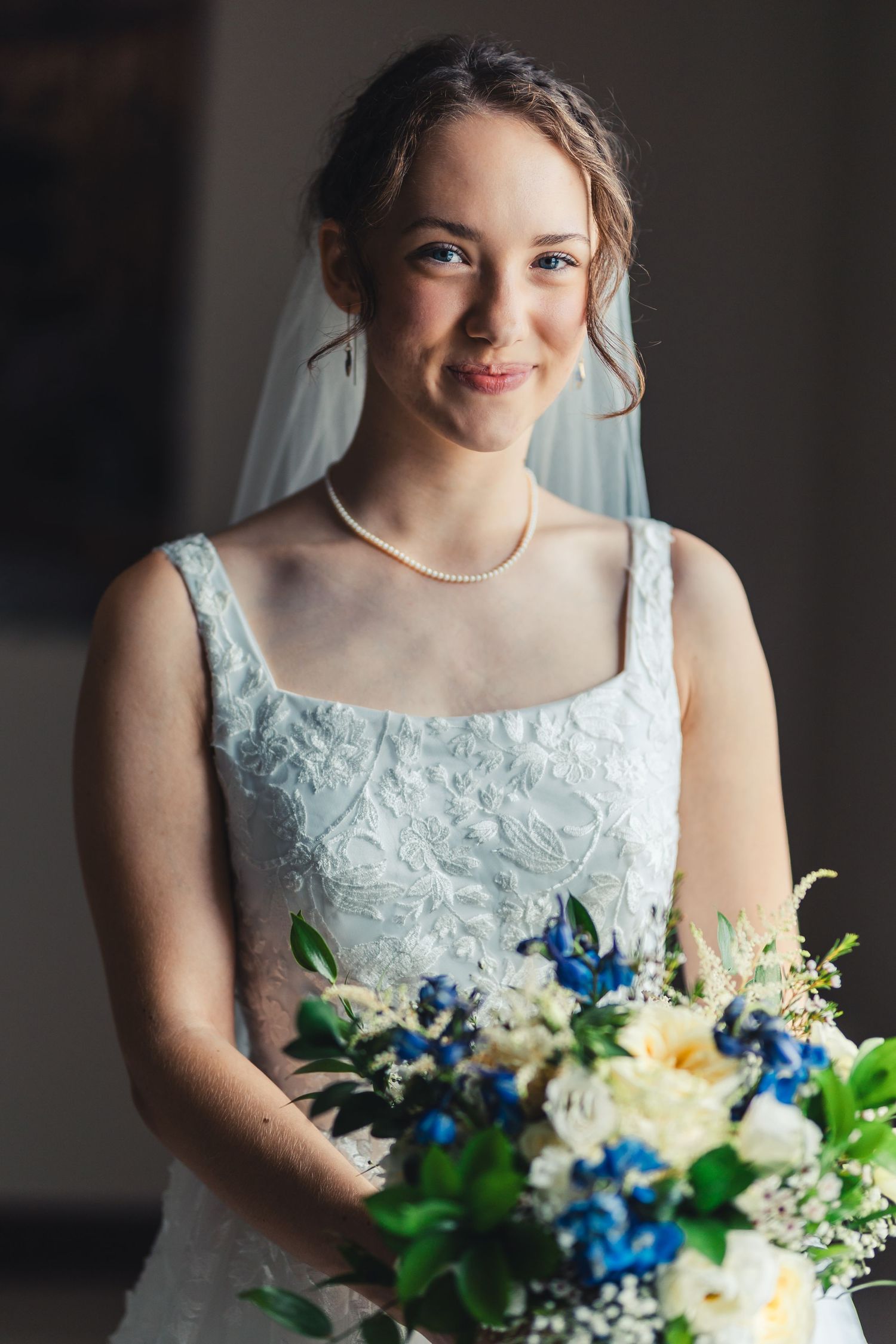 Bride holding bouquet during bridal portrait in Palm Beach Gardens wedding