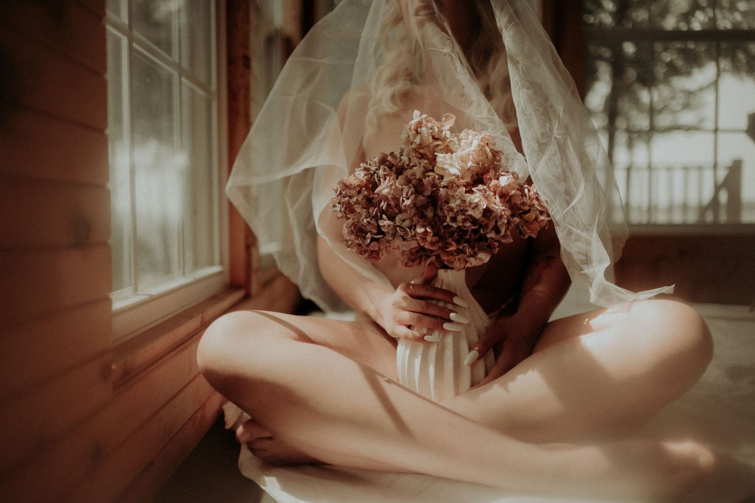 Intimate photograph series with dried florals and soft morning light.