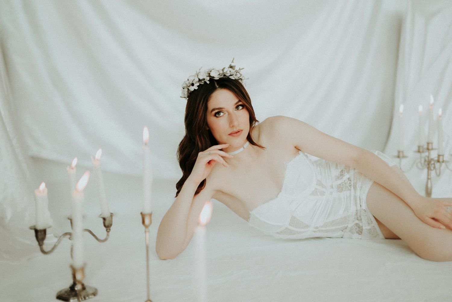 Elegant bridal boudoir photo collage featuring romantic poses in white lingerie against light backdrop.