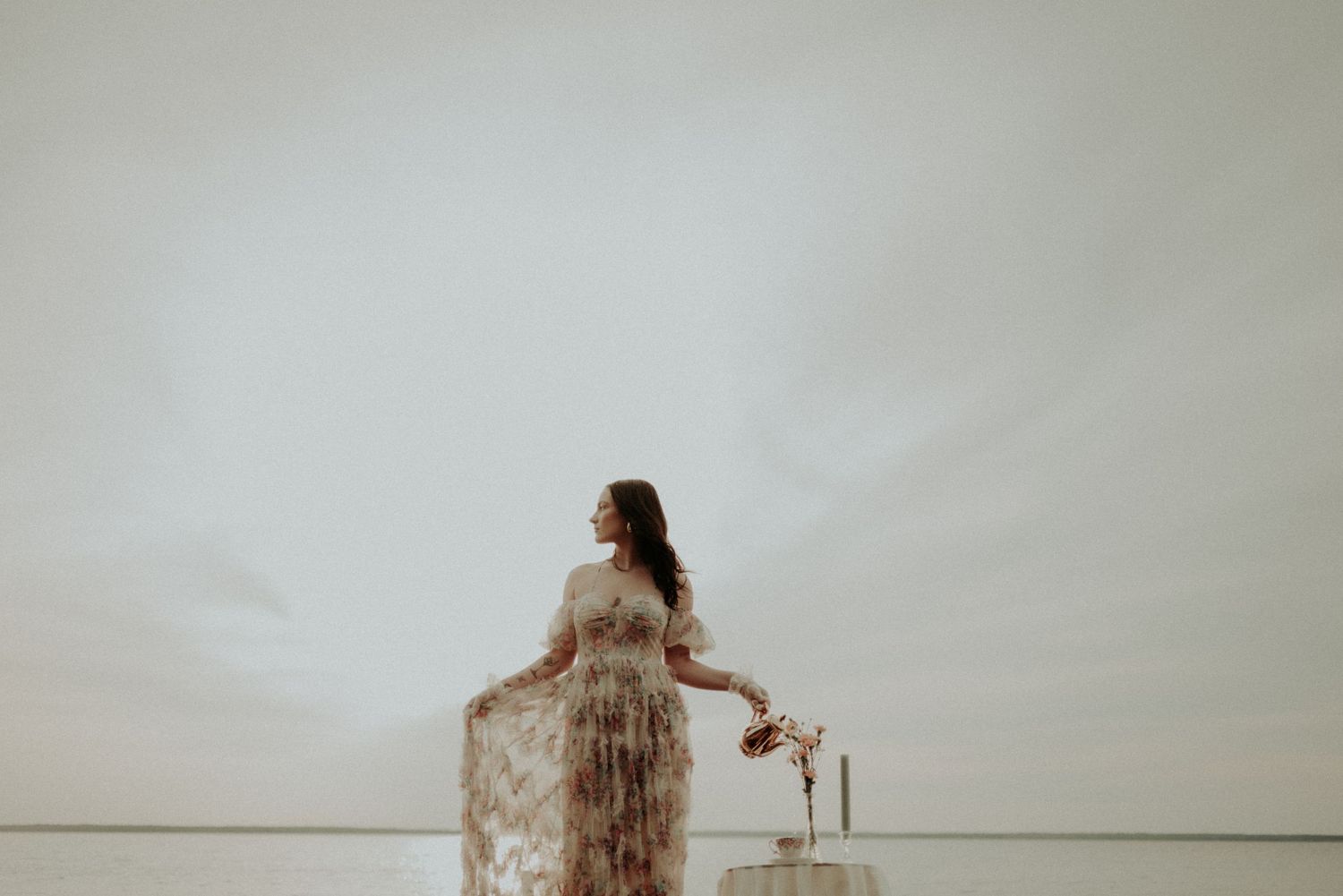 Surreal water photography featuring a floral dress and dreamy composition.