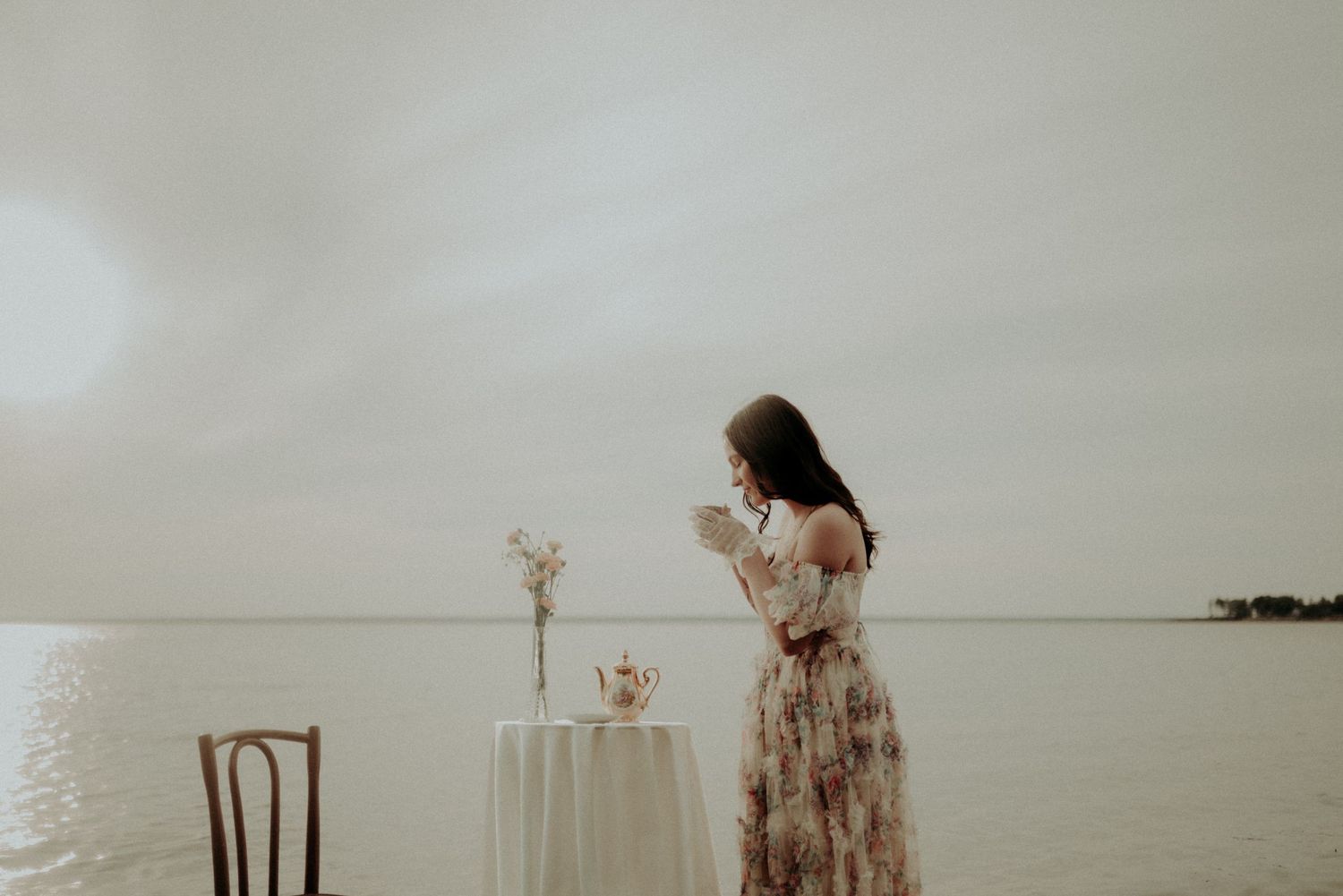 Ethereal lakeside photography with dreamy compositions and water elements.