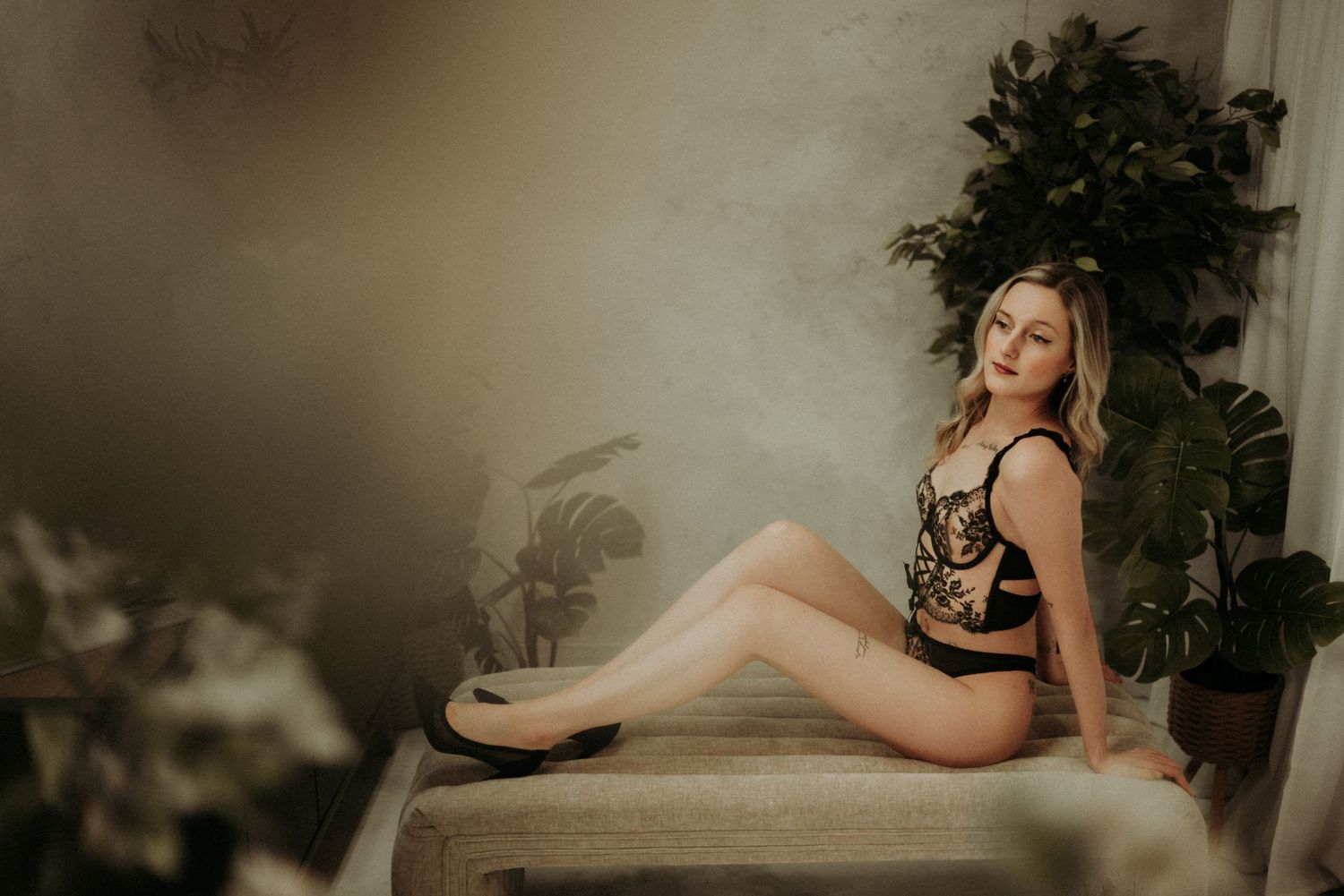 Collection of intimate boudoir photography portraits showcasing artistic poses and lighting effects.