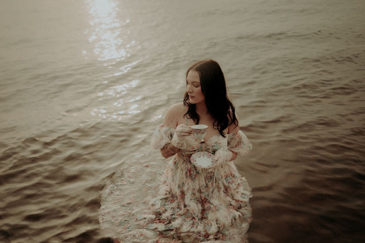 Artistic water photography sequence showing movement in a flowing dress.