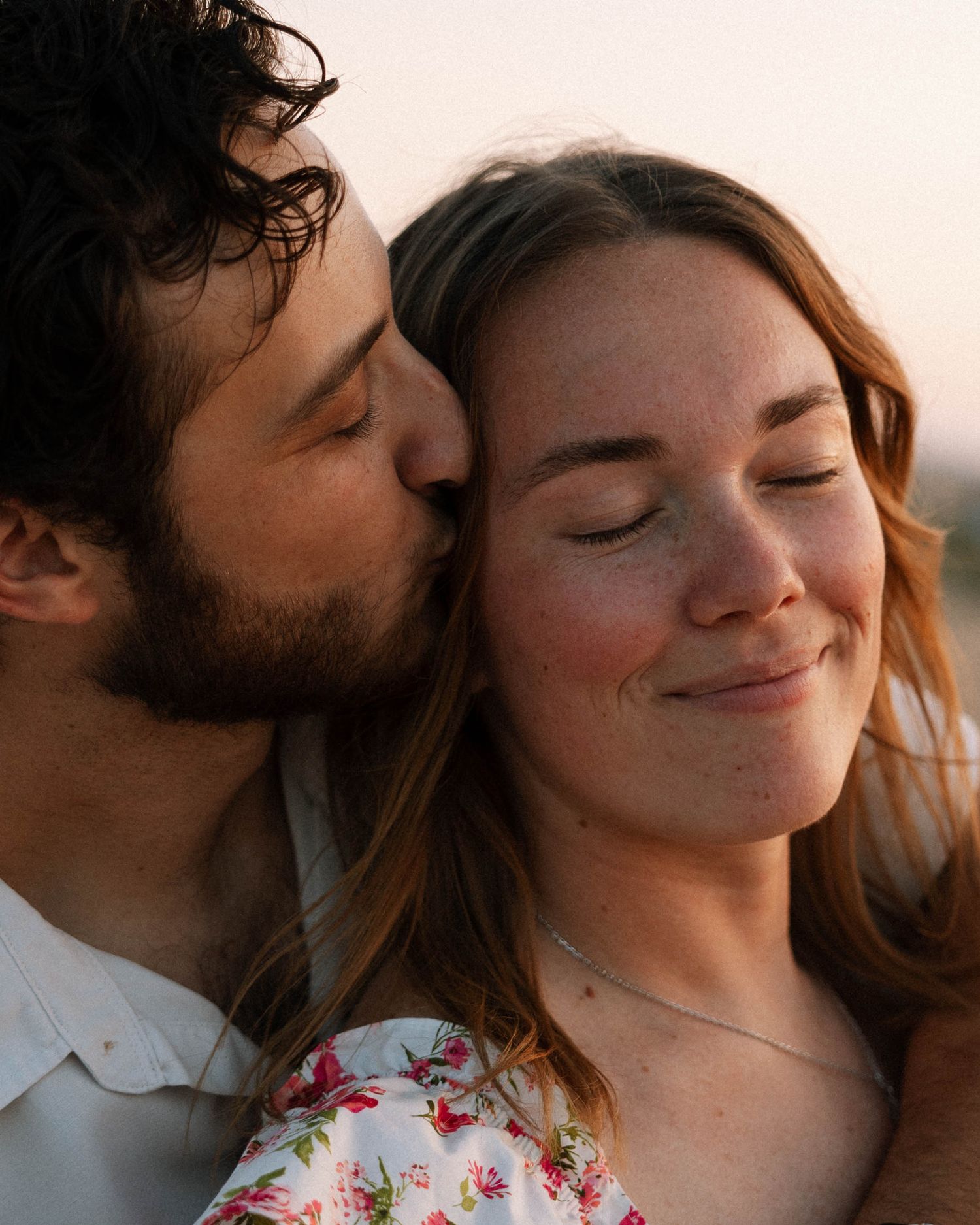 Virginia Beach wedding photographer photographs couples session with dogs.