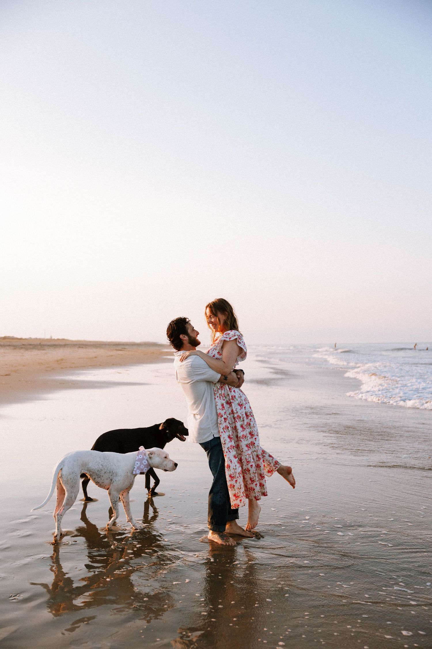 Virginia Beach wedding photographer photographs couples session with dogs.