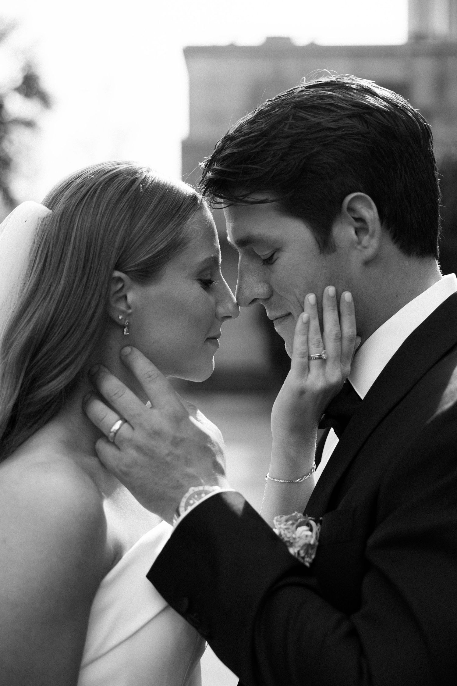 Black and white romantic wedding photography series showing intimate close-up moments between newlyweds. Virginia Beach wedding photographer