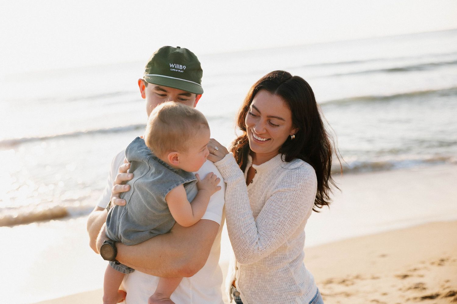 Virginia Beach family photographer photographs family at sunrise in Virginia Beach.