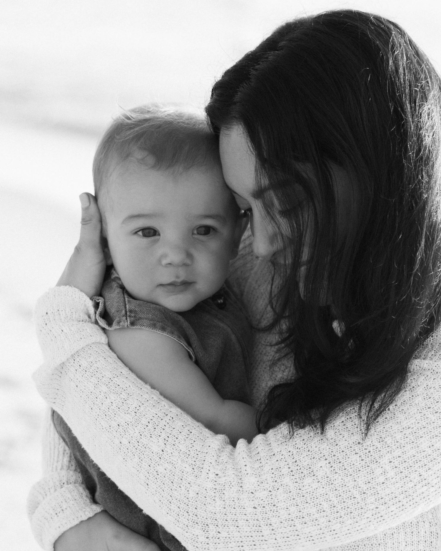Virginia Beach family photographer photographs family at sunrise in Virginia Beach.