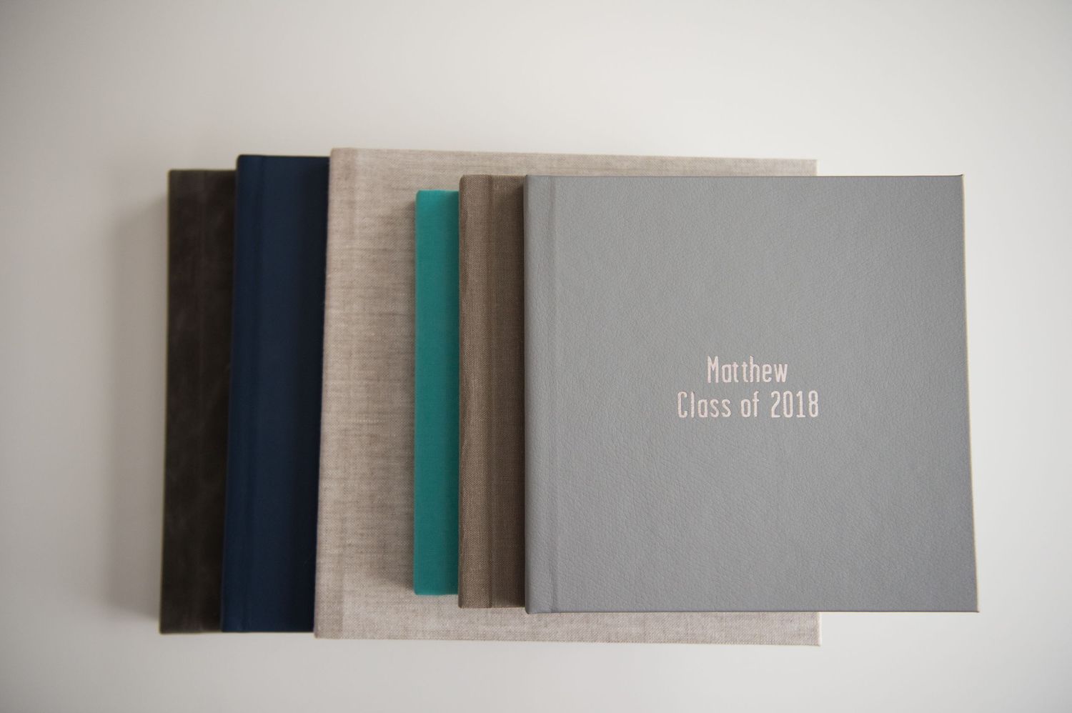 Professional photo album layout with minimalist gray design elements.