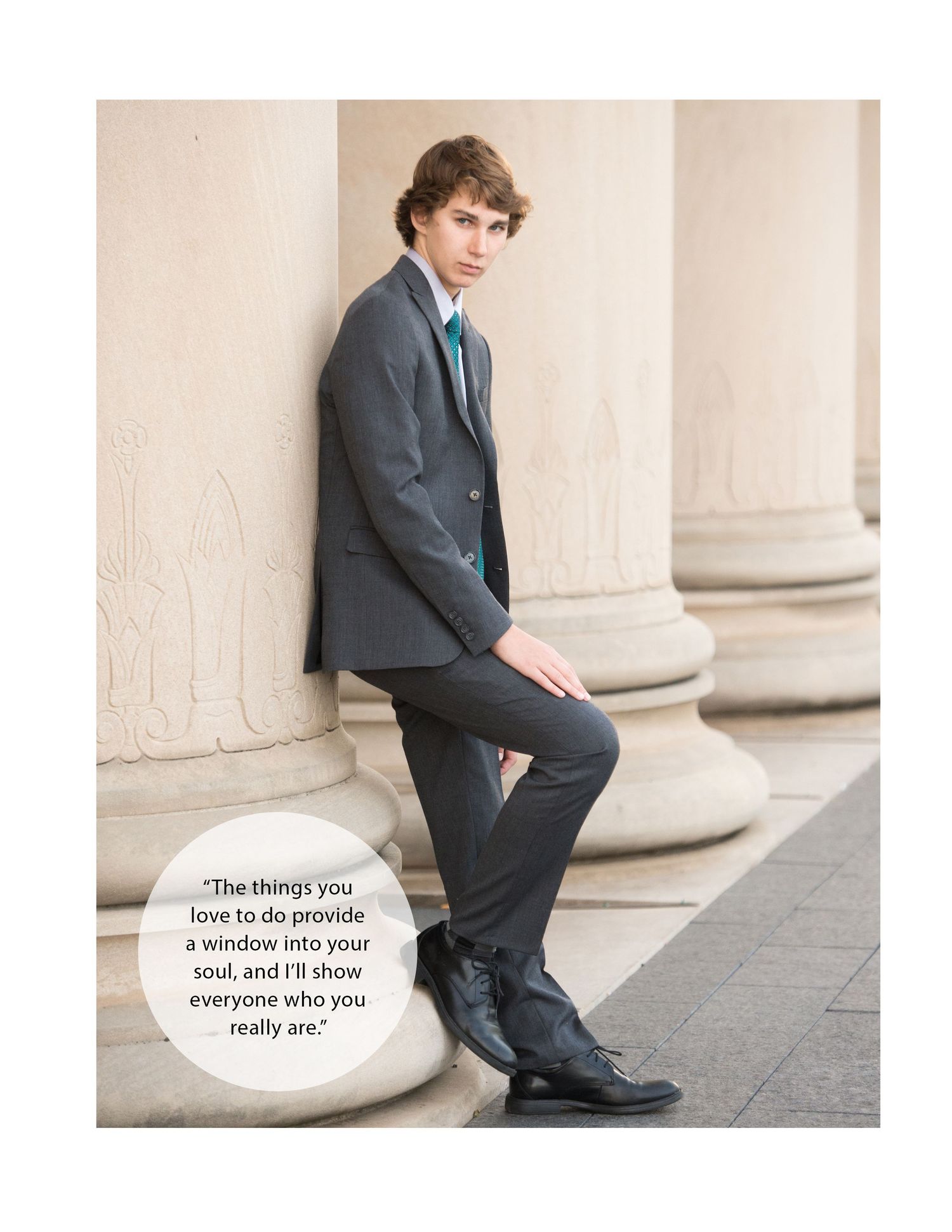 Senior portrait session featuring formal attire and architectural columns as backdrop.